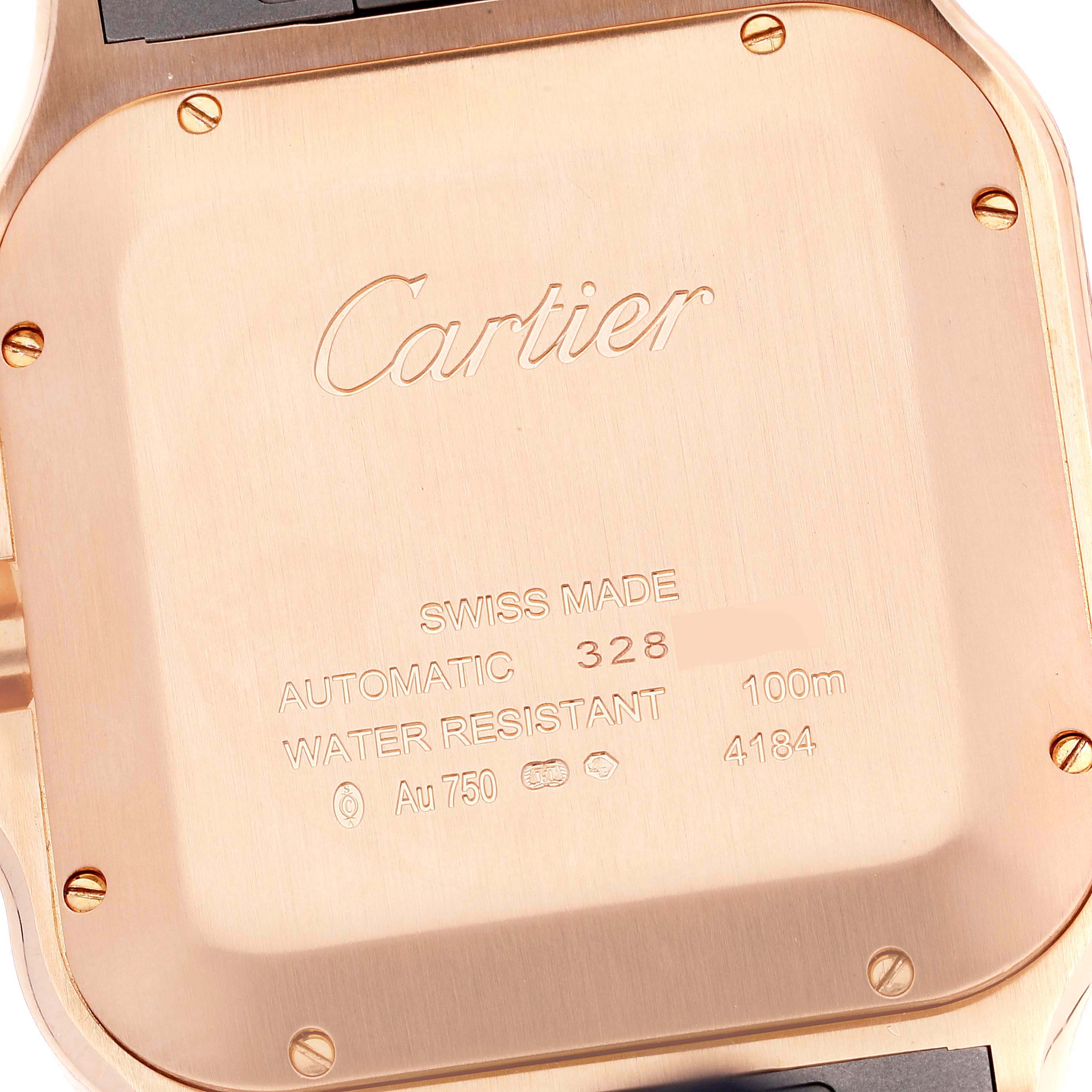 This image shows the back case of a Cartier Santos WGSA0017 Men's Rose Gold Silver Dial WGSA0017 Men's Rose Gold Silver Dial model watch, highlighting its engraving details and screws.