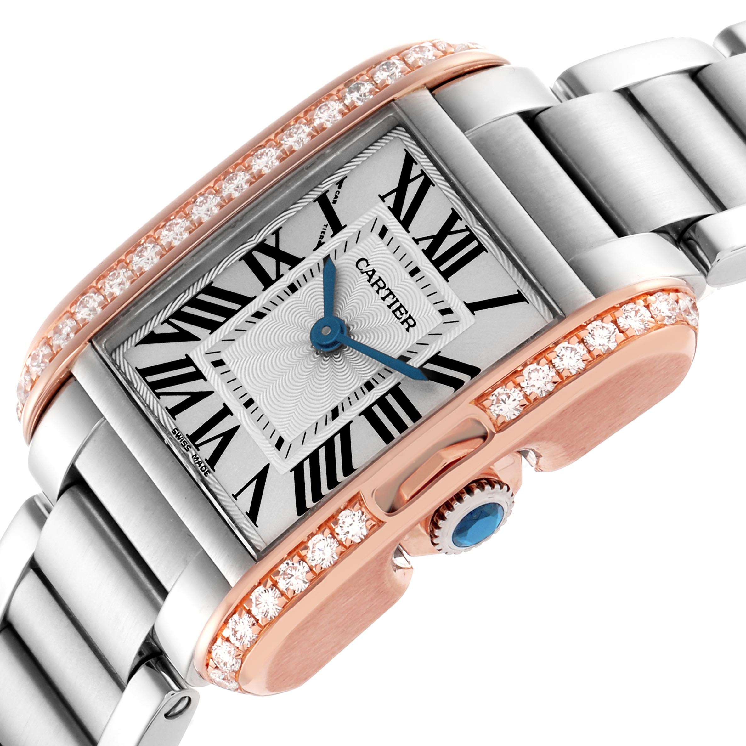 The Cartier Tank Anglaise W3TA0002 Women
s Steel and Gold (two tone) Silver Dial W3TA0002 Women
s Steel and Gold (two tone) Silver Dial watch is shown at an angled close-up, highlighting the face, crown, and diamond-encrusted bezel.