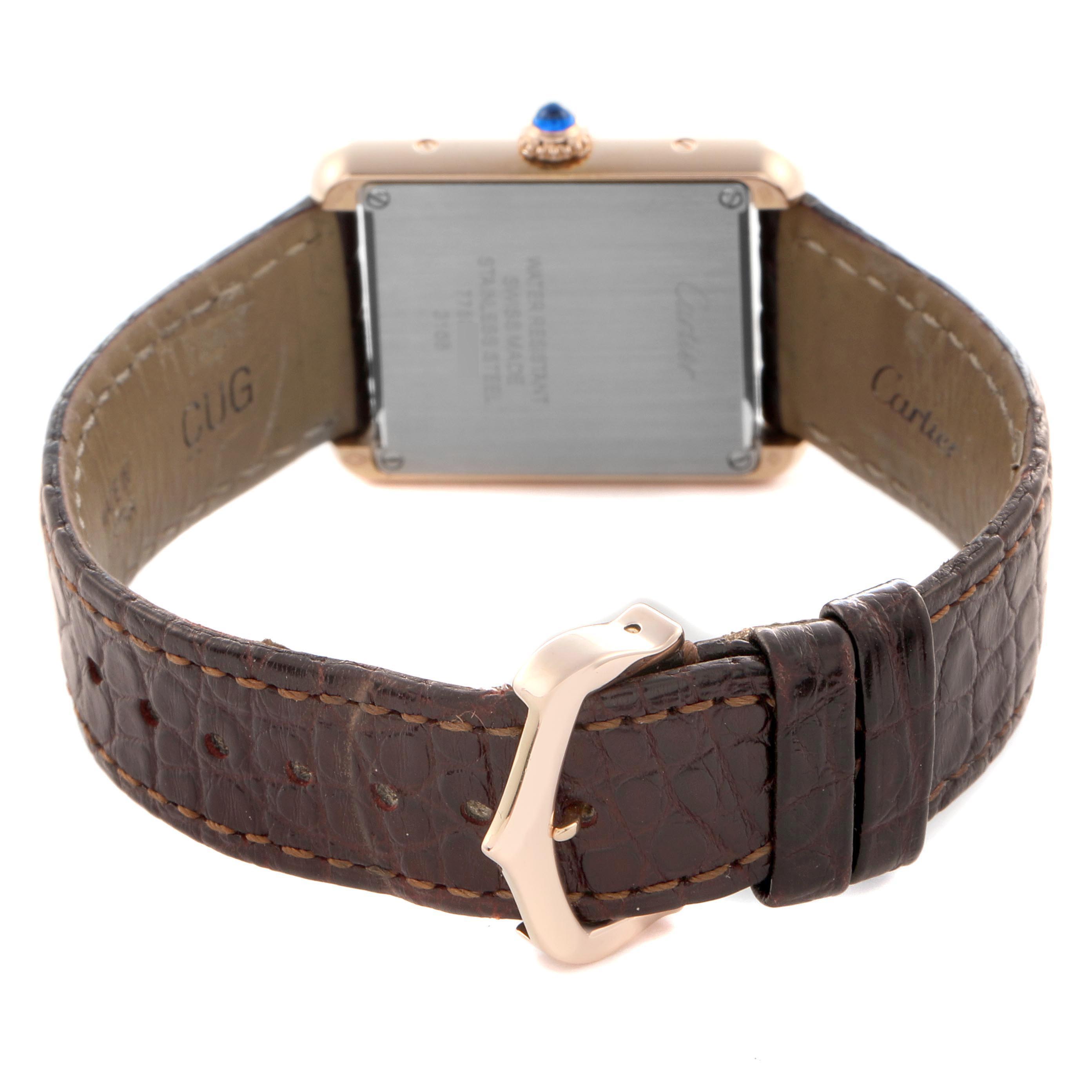 The image shows the back and buckle of a Cartier Tank Solo W5200024 Women
s Steel and Gold (two tone) Silver Dial W5200024 Women
s Steel and Gold (two tone) Silver Dial watch, highlighting the strap and case back.