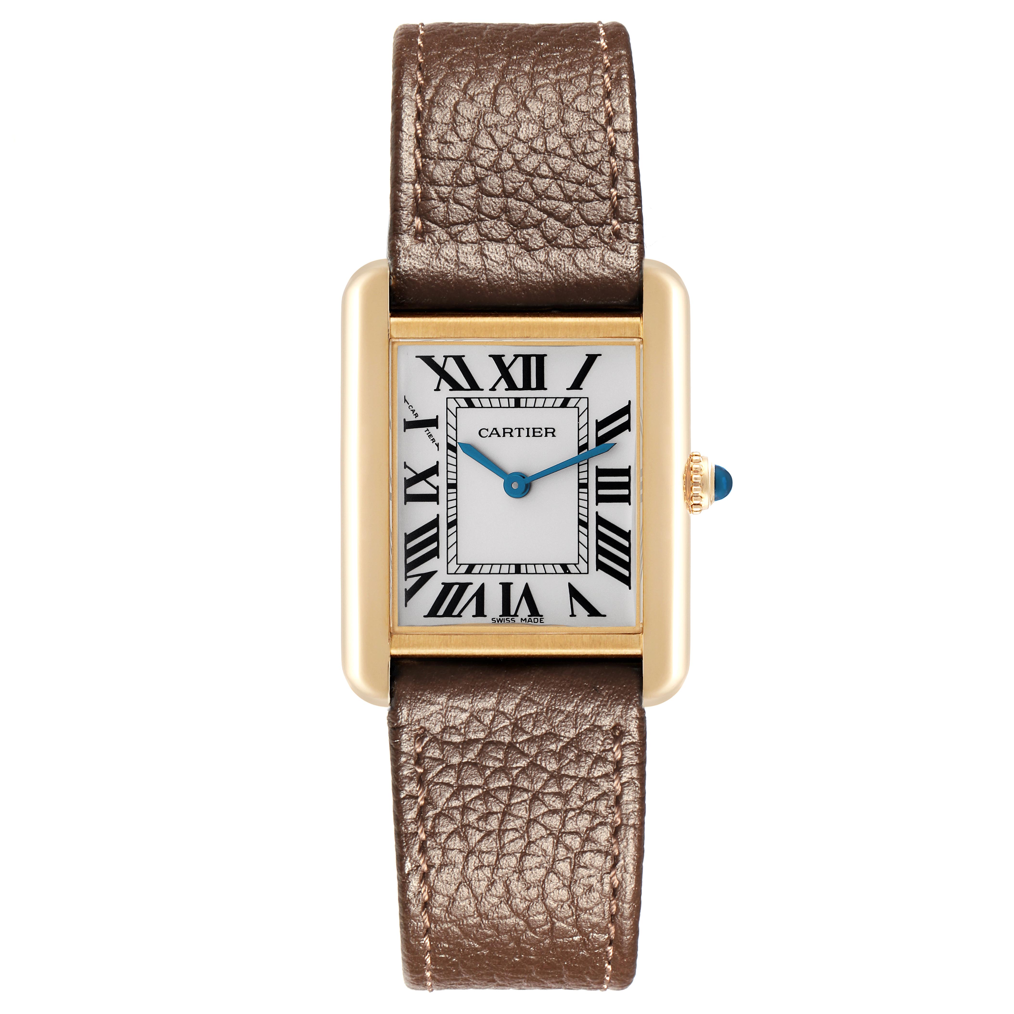 The Cartier Tank Solo W1018755 Women
s Steel and Gold (two tone) Silver Dial W1018755 Women
s Steel and Gold (two tone) Silver Dial watch is shown from the front, displaying the dial, Roman numerals, blue hands, and brown leather strap.