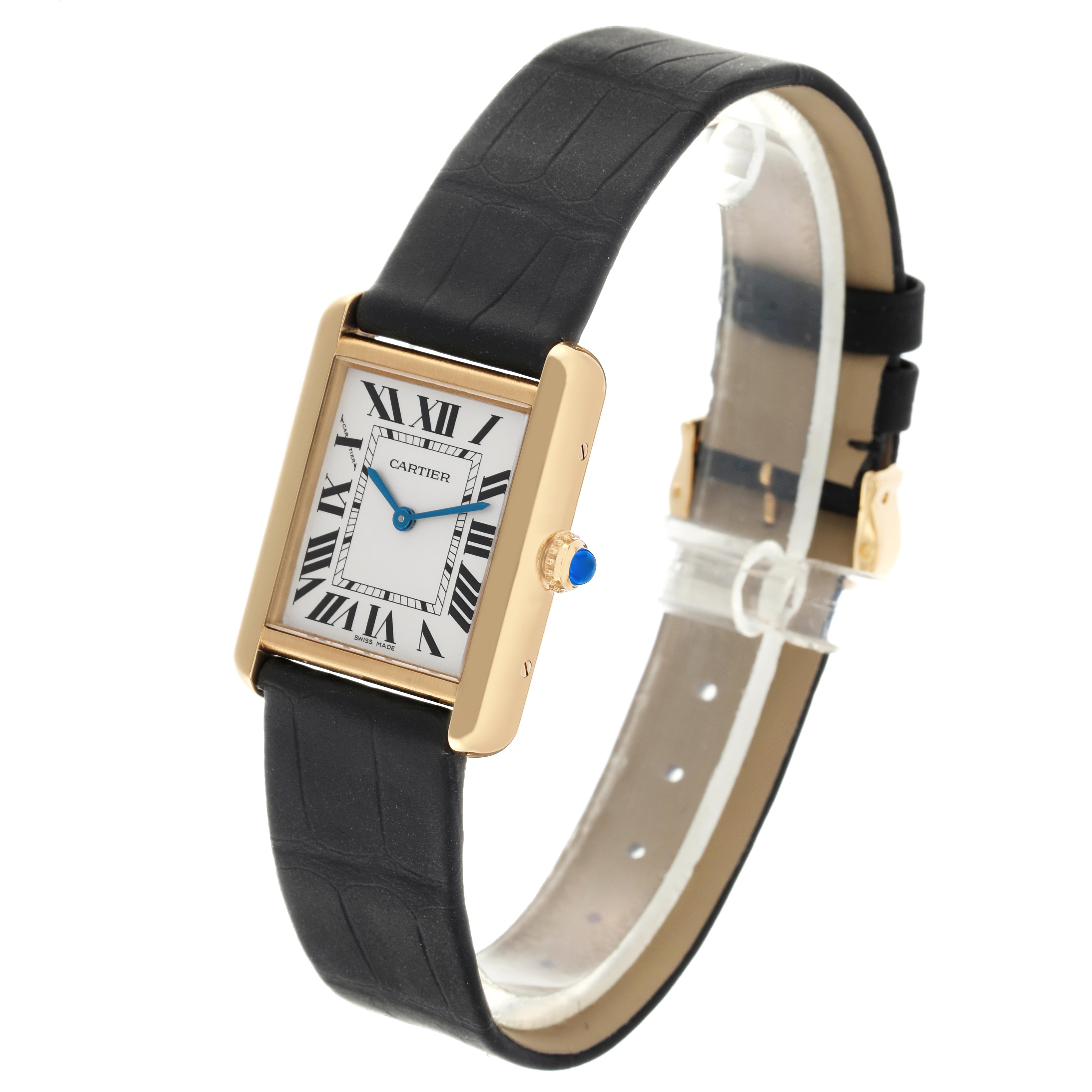 The Cartier Tank Solo W5200002 Women
s Steel and Gold (two tone) Silver Dial W5200002 Women
s Steel and Gold (two tone) Silver Dial watch is shown at an angle displaying its face, crown, and black strap.