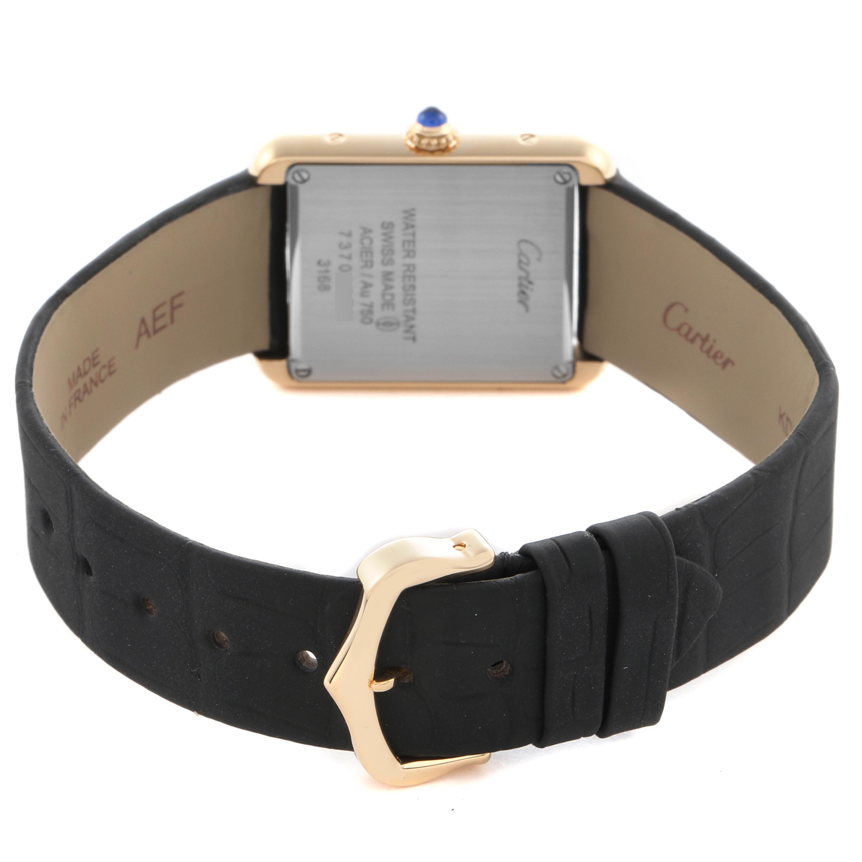 The image shows the back view of a Cartier Tank Solo W5200002 Women
s Steel and Gold (two tone) Silver Dial W5200002 Women
s Steel and Gold (two tone) Silver Dial watch, displaying the case back, strap, and clasp.