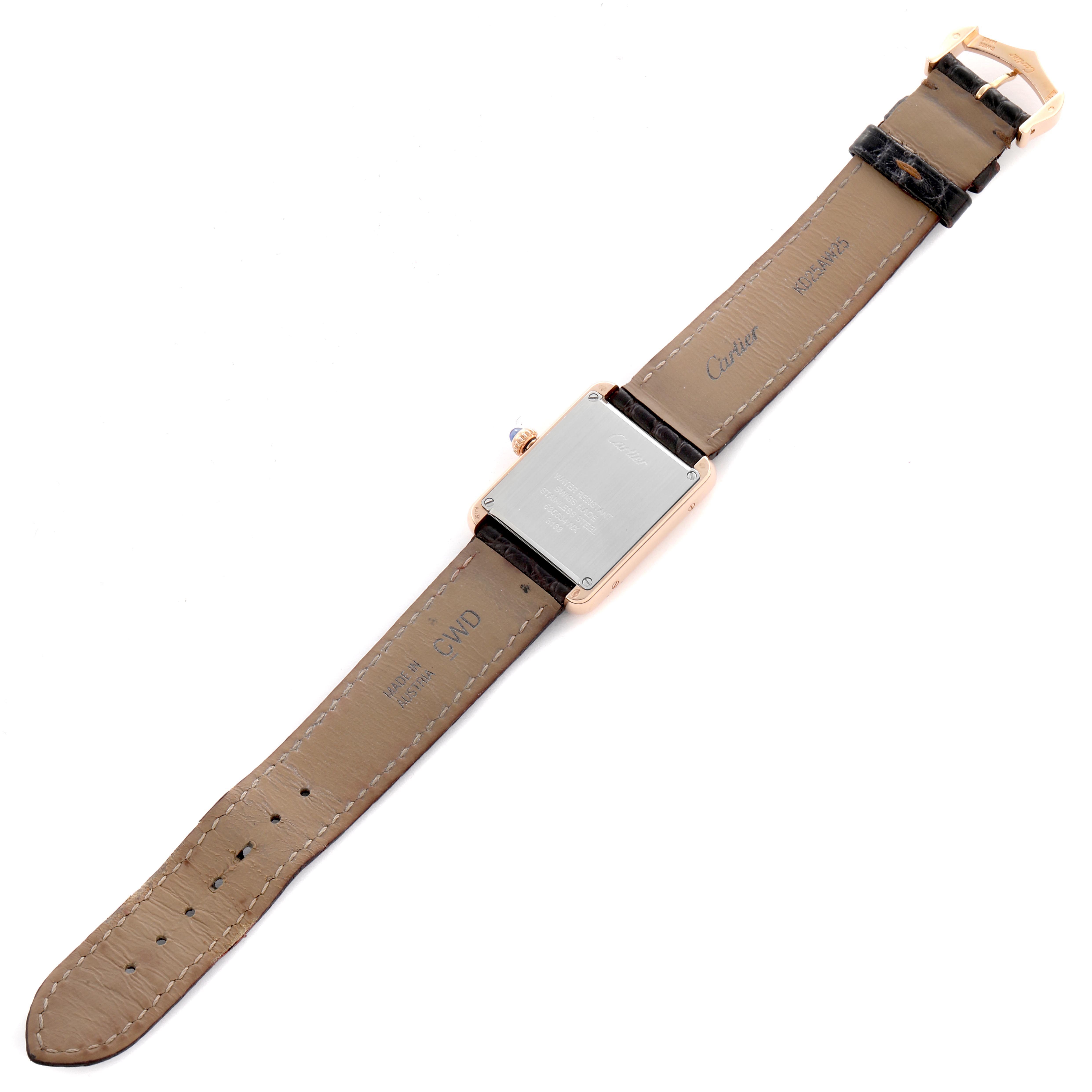 The Cartier Tank Solo W5200002 Women
s Steel and Gold (two tone) Silver Dial W5200002 Women
s Steel and Gold (two tone) Silver Dial watch is shown from the back, displaying the case back and leather strap with buckle.