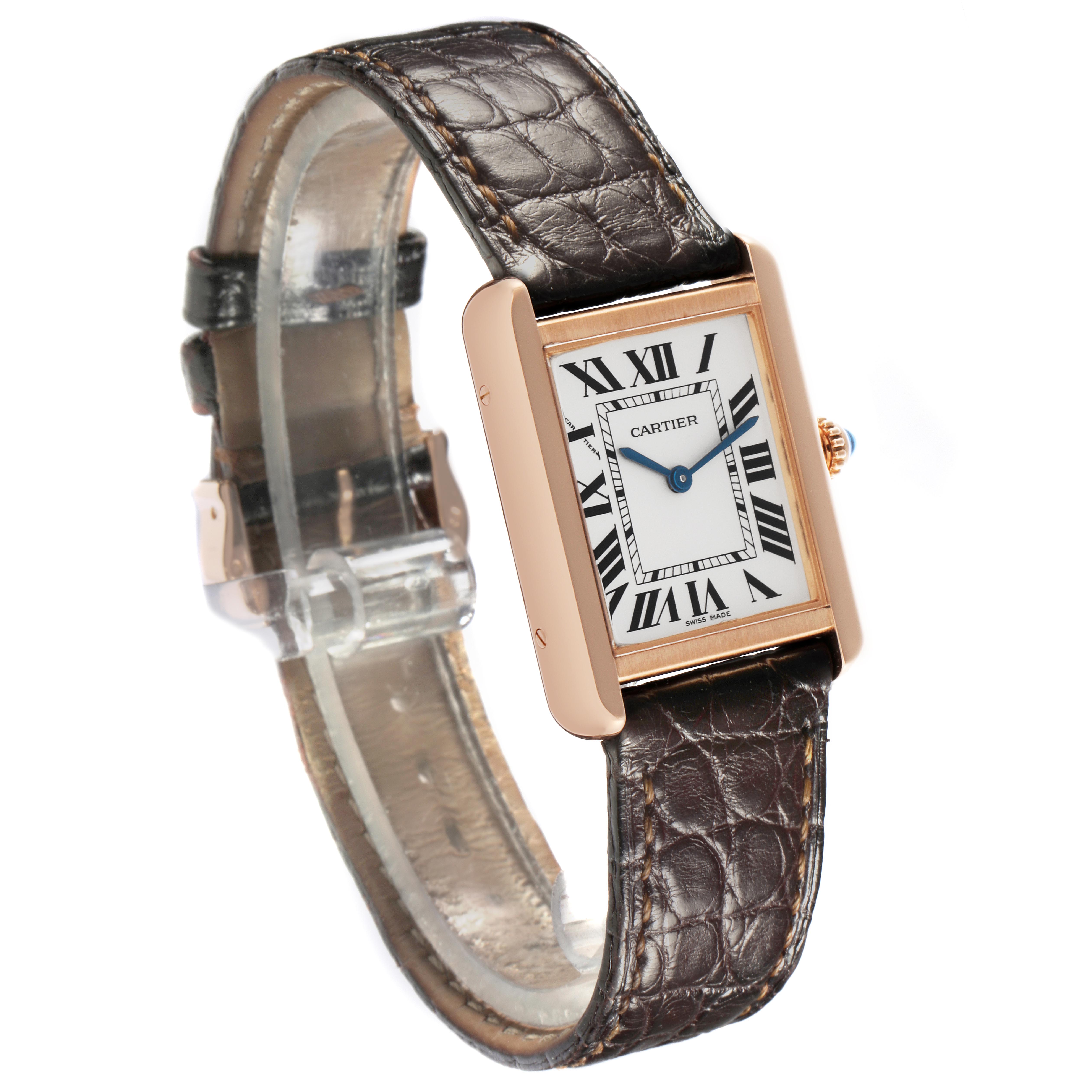 The Cartier Tank Solo W5200002 Women
s Steel and Gold (two tone) Silver Dial W5200002 Women
s Steel and Gold (two tone) Silver Dial watch is shown at an angled view, displaying the face, crown, and brown leather strap.