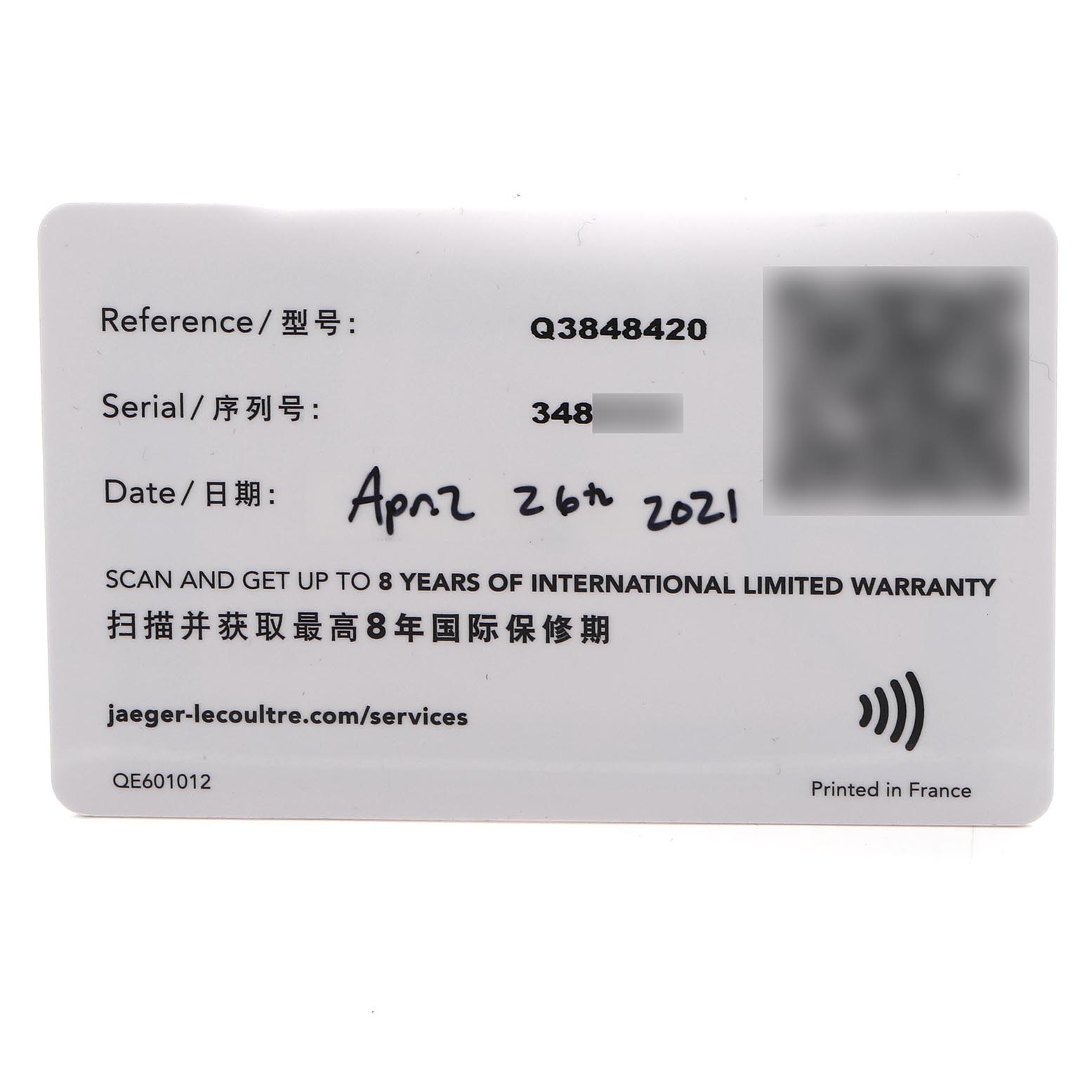 The image shows a Jaeger LeCoultre Reverso Q3848420 Men
s Stainless Steel Silver Dial Q3848420 Men
s Stainless Steel Silver Dial warranty card with reference and serial numbers.