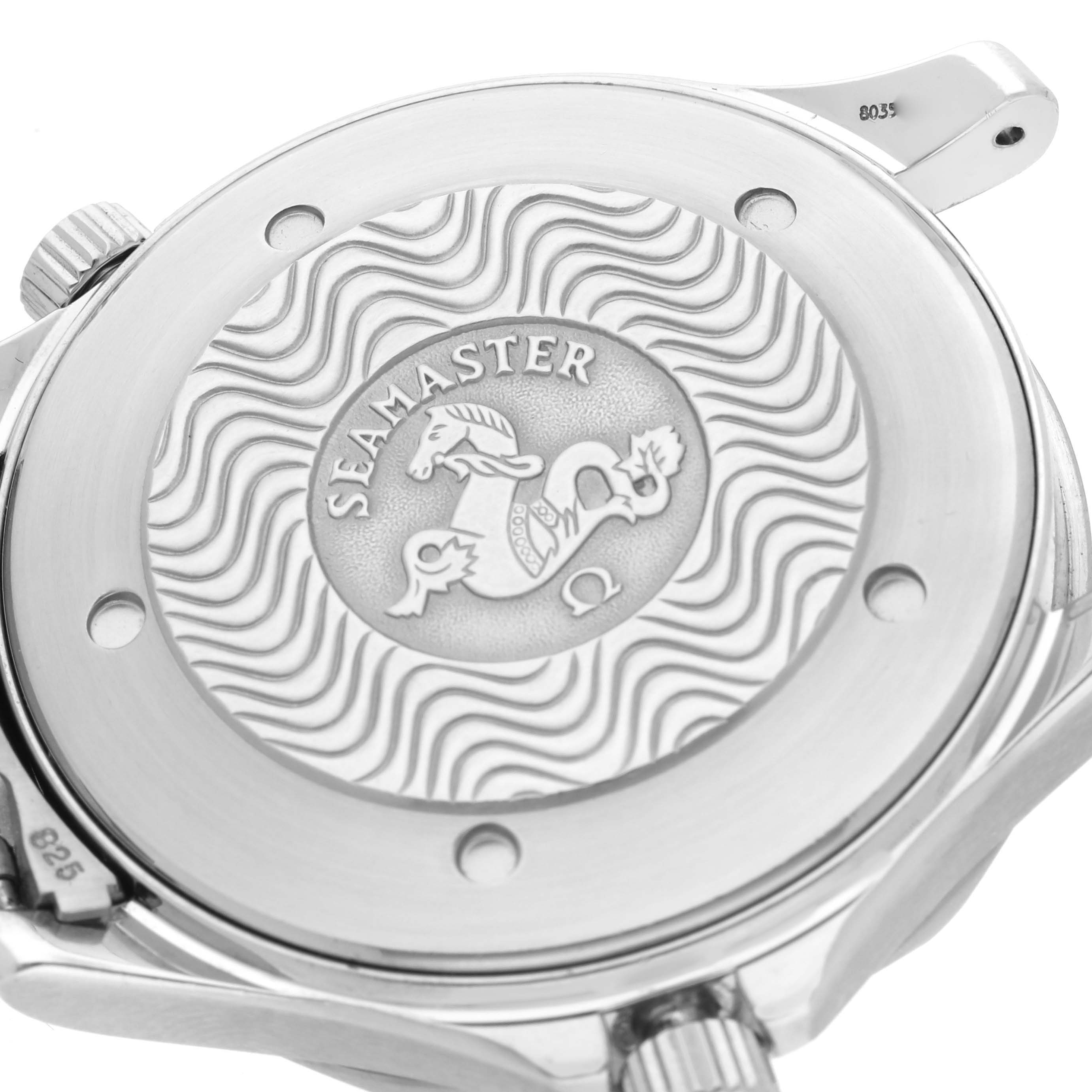 The image shows the back case of an Omega Seamaster 2531.80.00 Men
s Stainless Steel Blue Dial 2531.80.00 Men
s Stainless Steel Blue Dial watch, highlighting its engraved emblem and wave pattern design.