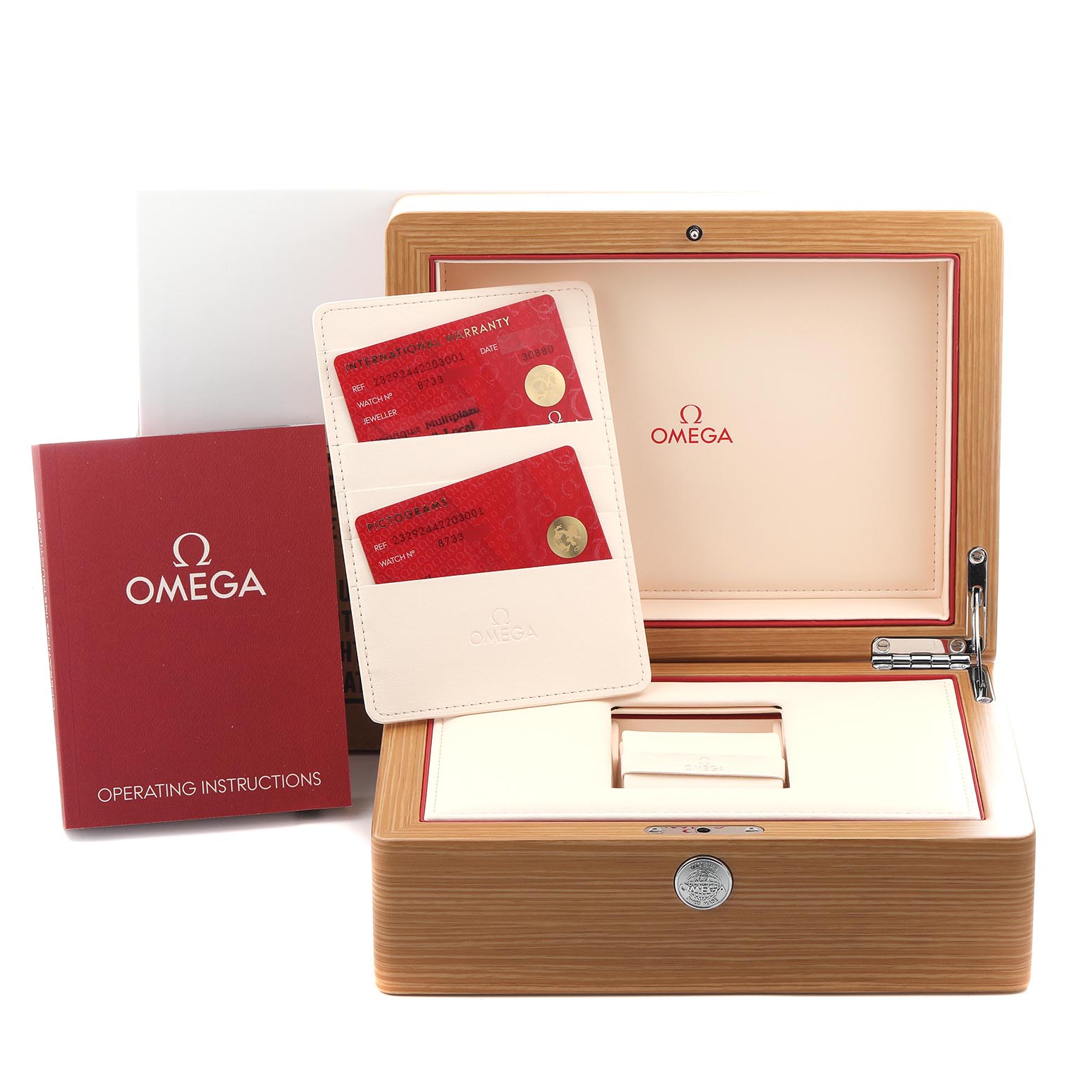 This image shows the Omega Planet Ocean 232.92.44.22.03.001 Men
s Stainless Steel Blue Dial 232.92.44.22.03.001 Men
s Stainless Steel Blue Dial watch box, warranty cards, and operating instructions from a front angle.