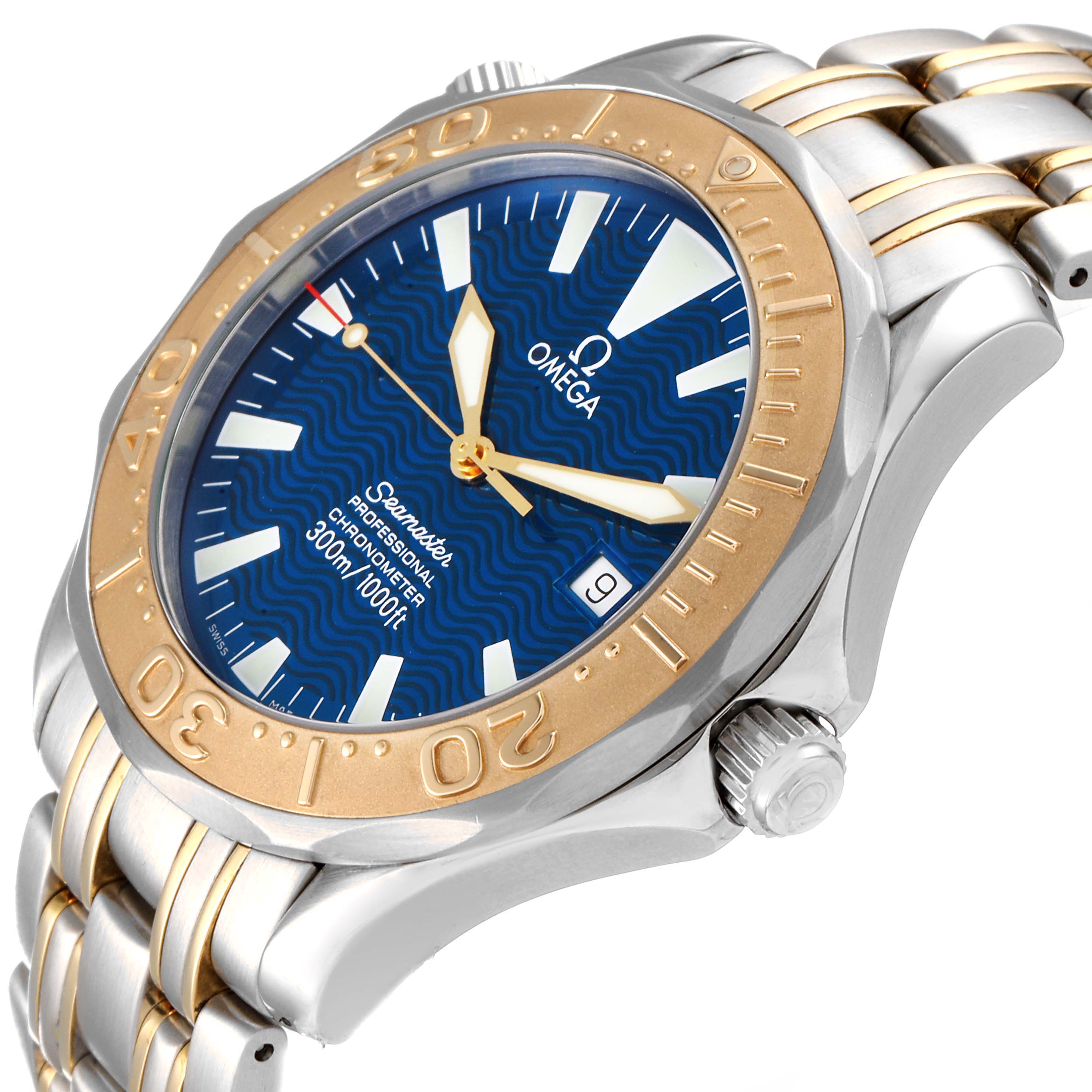 The Omega Seamaster 2455.80.00 Men's Steel and Gold (two tone) Blue Dial 2455.80.00 Men's Steel and Gold (two tone) Blue Dial watch is shown at an angled close-up, highlighting the blue dial, bezel, crown, and part of the bracelet.
