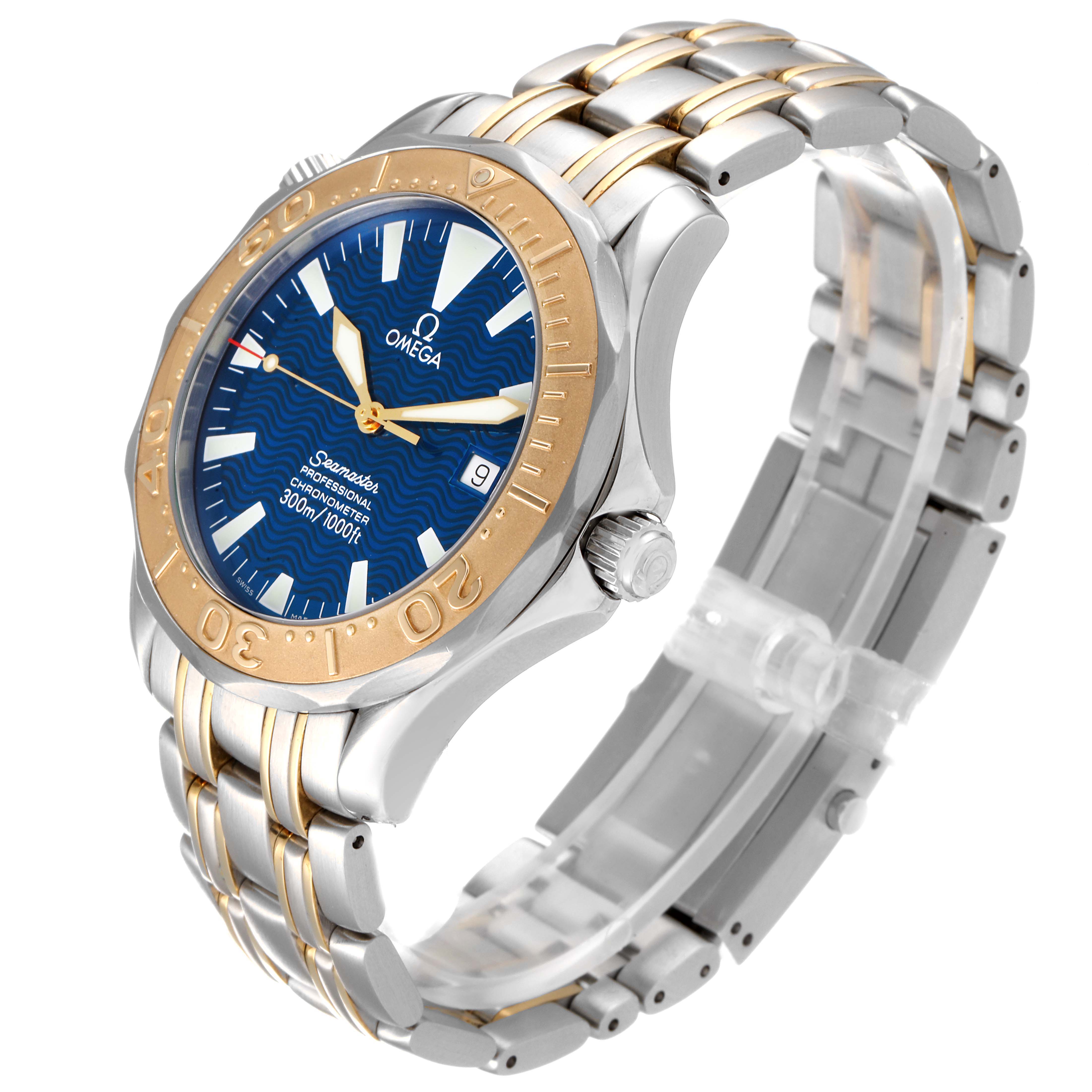 The Omega Seamaster 2455.80.00 Men's Steel and Gold (two tone) Blue Dial 2455.80.00 Men's Steel and Gold (two tone) Blue Dial watch is shown from an angled side view, highlighting the blue dial, gold bezel, crown, and two-tone bracelet.