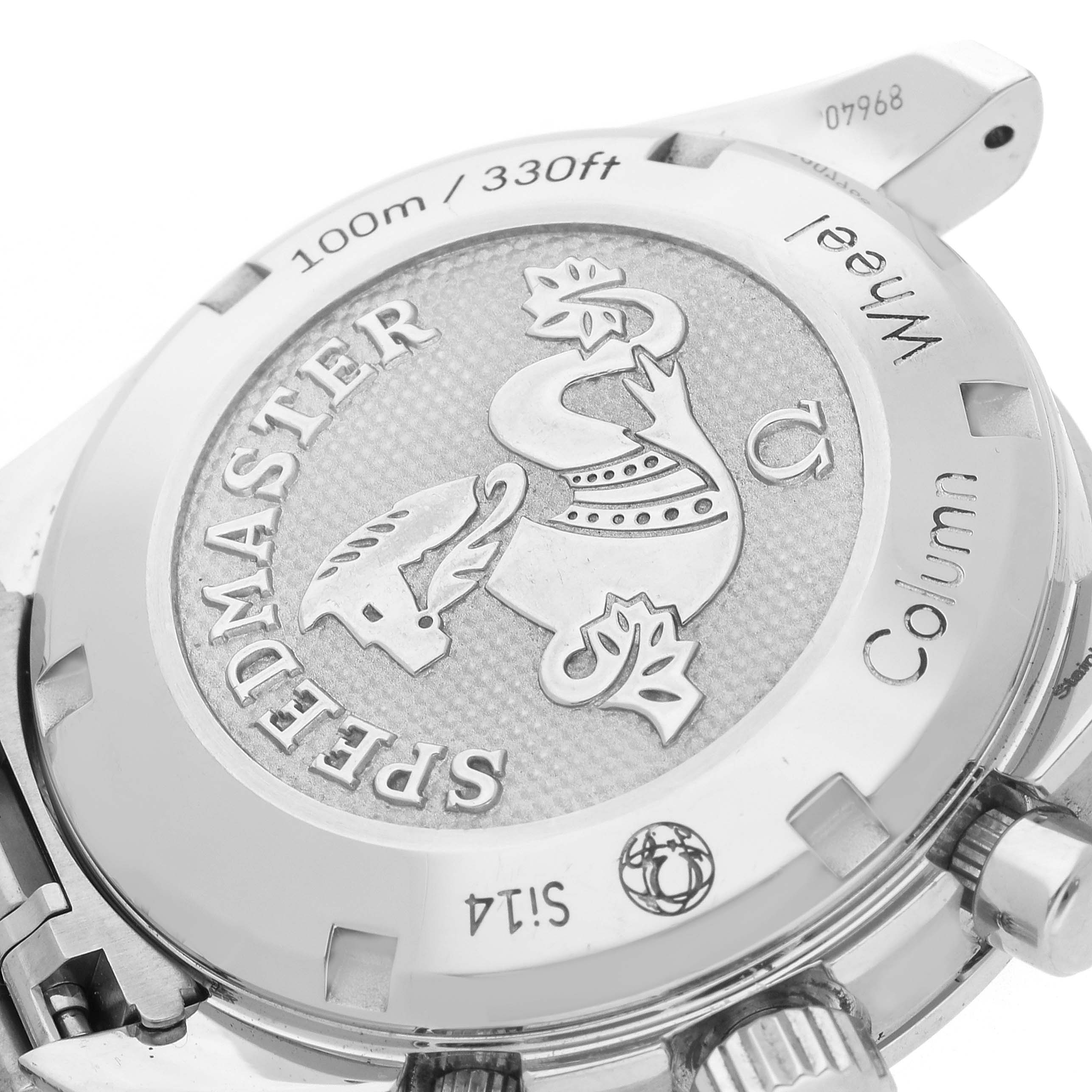 The image shows the case back of an Omega Speedmaster 324.30.38.50.02.001 Men
s Stainless Steel Silver Dial 324.30.38.50.02.001 Men
s Stainless Steel Silver Dial, highlighting its embossed design and engravings.