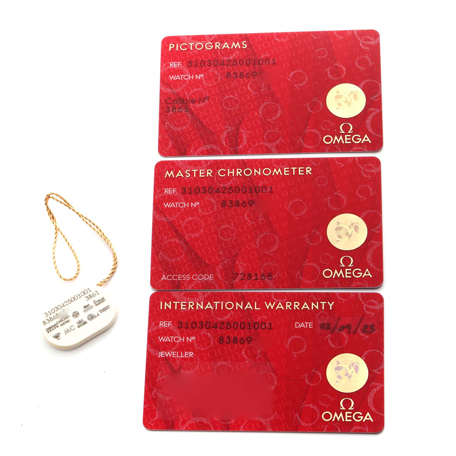 The image shows Omega Speedmaster 310.30.42.50.01.001 Men
s Stainless Steel Black Dial 310.30.42.50.01.001 Men
s Stainless Steel Black Dial model cards and a tag, displaying pictograms, master chronometer, and warranty details.