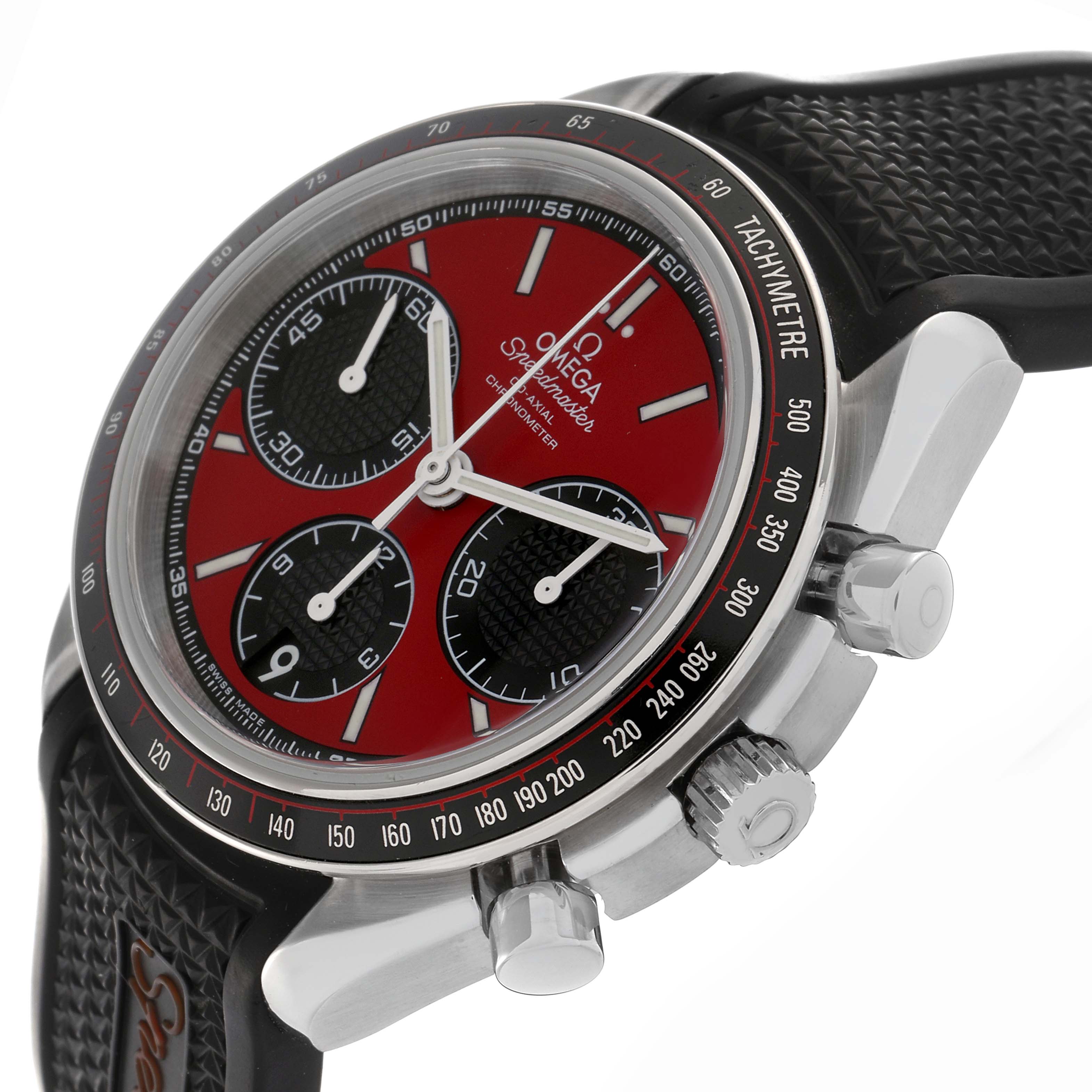 The image shows an angled view of the Omega Speedmaster 326.32.40.50.11.001 Men's Stainless Steel Red Dial 326.32.40.50.11.001 Men's Stainless Steel Red Dial, highlighting the dial, tachymeter bezel, crown, and pushers.