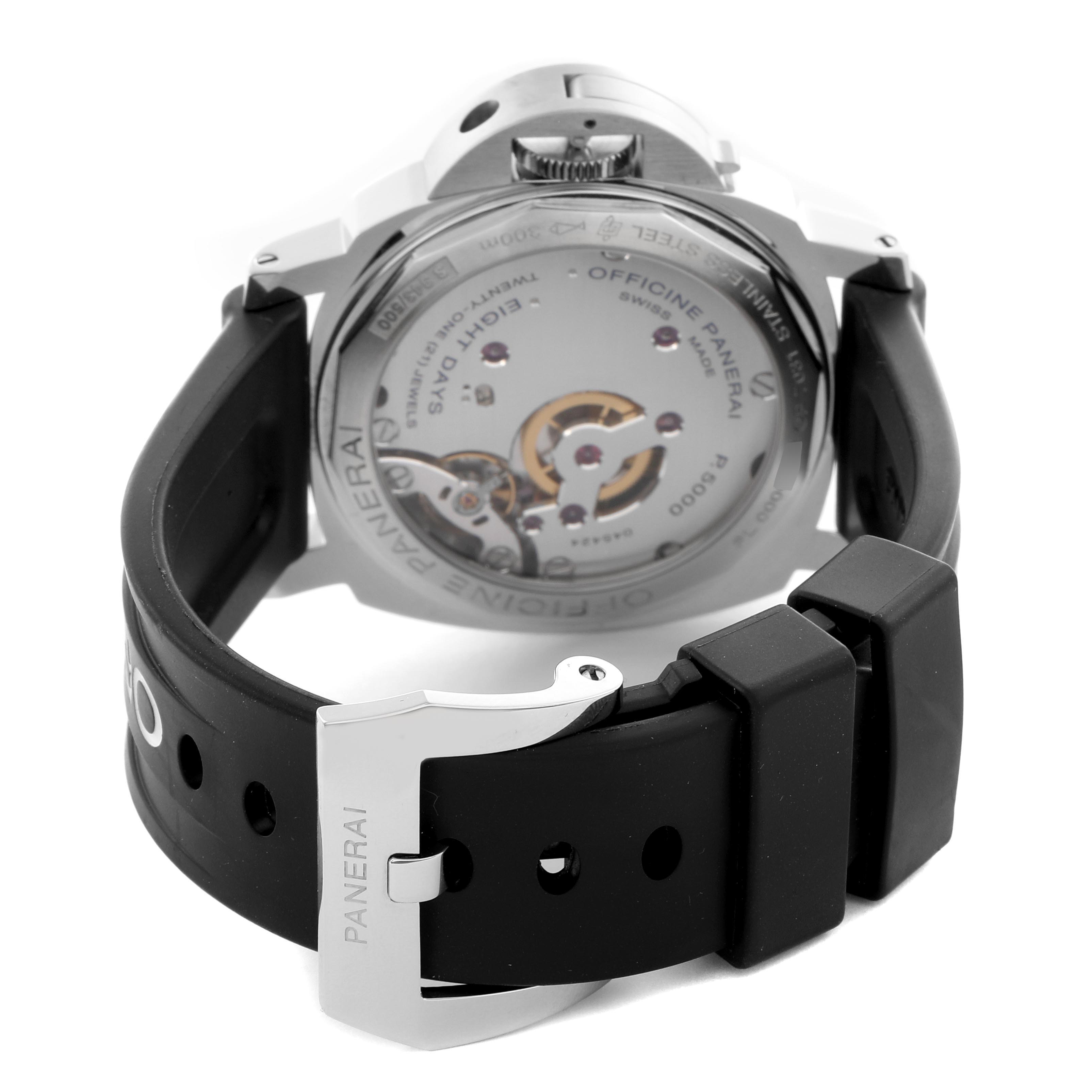 The Panerai Luminor PAM00561 Men
s Stainless Steel White Dial PAM00561 Men
s Stainless Steel White Dial watch is shown from the back, highlighting the movement and black rubber strap with buckle.