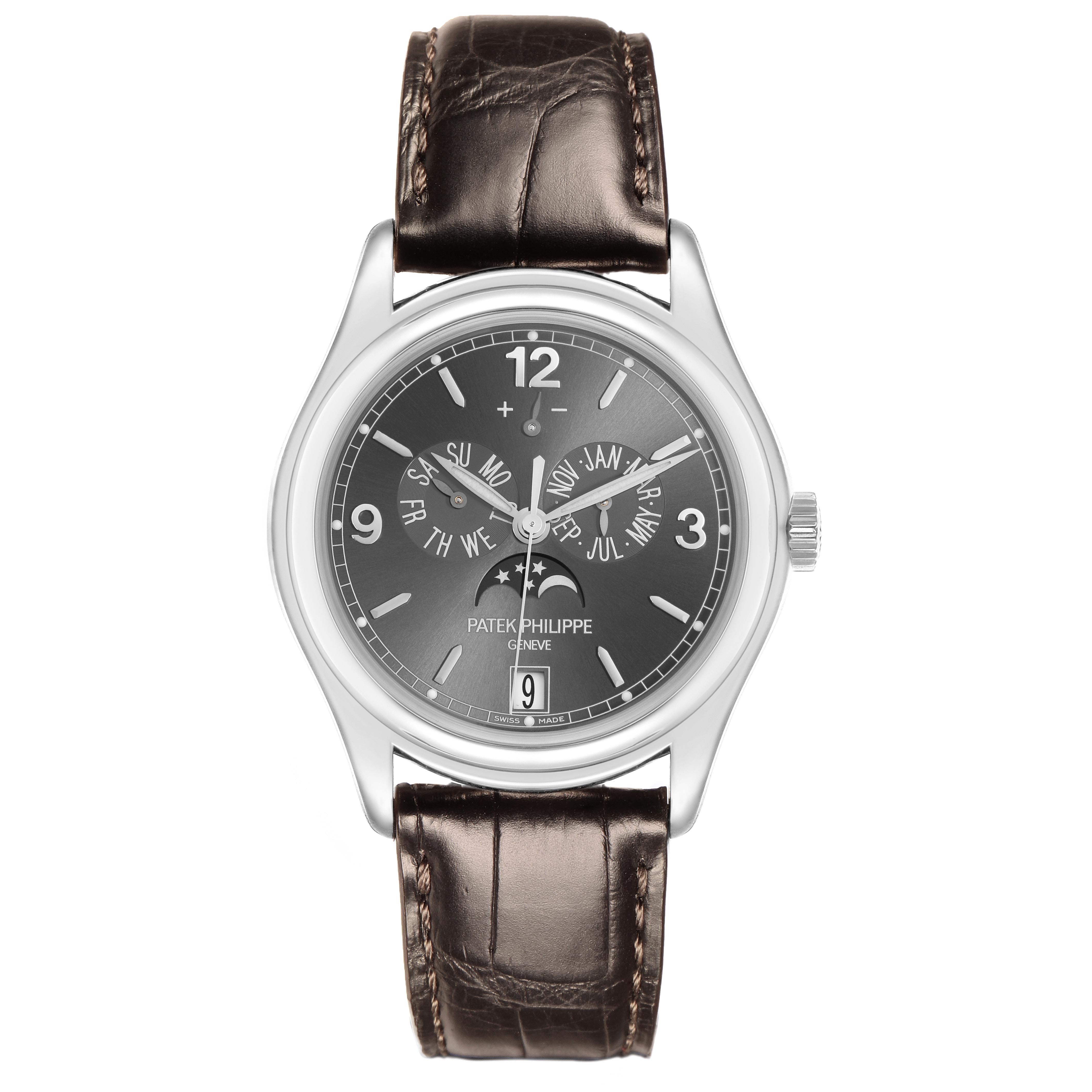 The Patek Philippe Complications 5146G-010 Men
s White Gold Grey Dial 5146G-010 Men
s White Gold Grey Dial watch is shown from a front angle, displaying the dial, hands, and leather strap.