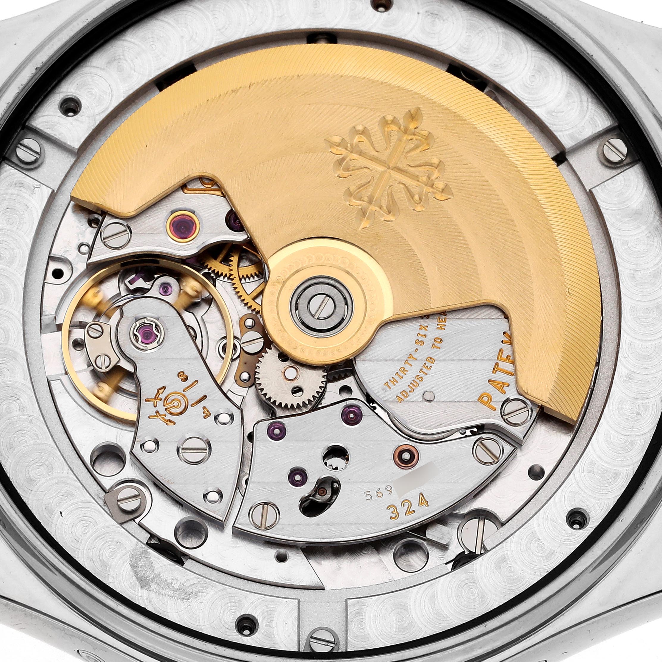 The image shows the back view of a Patek Philippe Complications 5146G-010 Men
s White Gold Grey Dial 5146G-010 Men
s White Gold Grey Dial watch, revealing intricate movement and rotor details.