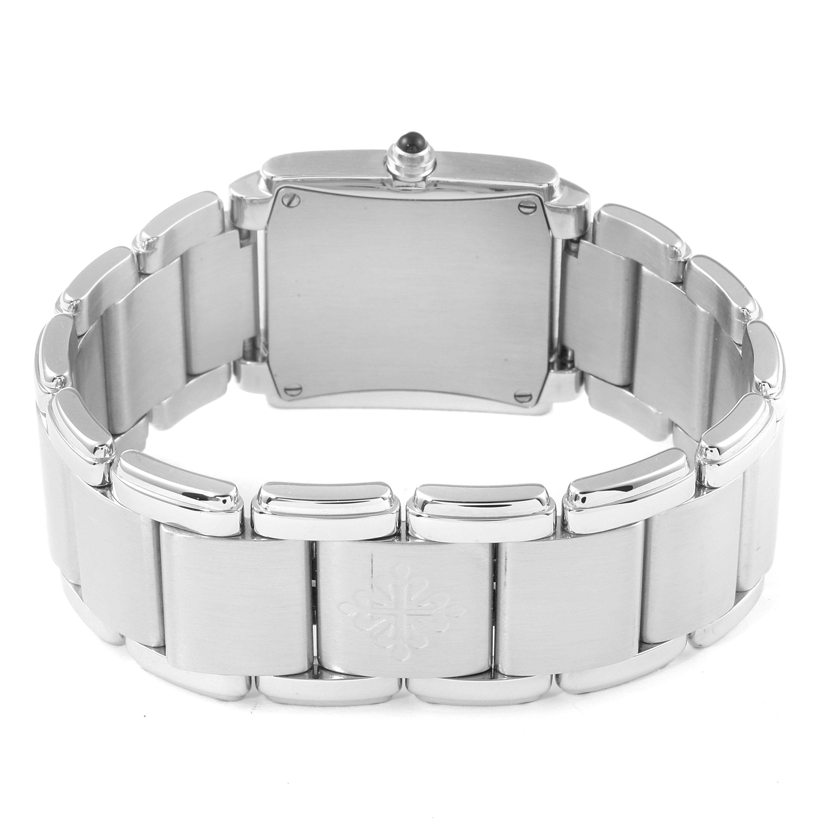 The image shows a Patek Philippe Twenty-4 4910/10A-010 Women's Stainless Steel Silver Dial 4910/10A-010 Women's Stainless Steel Silver Dial watch from the back, highlighting the bracelet and case back.