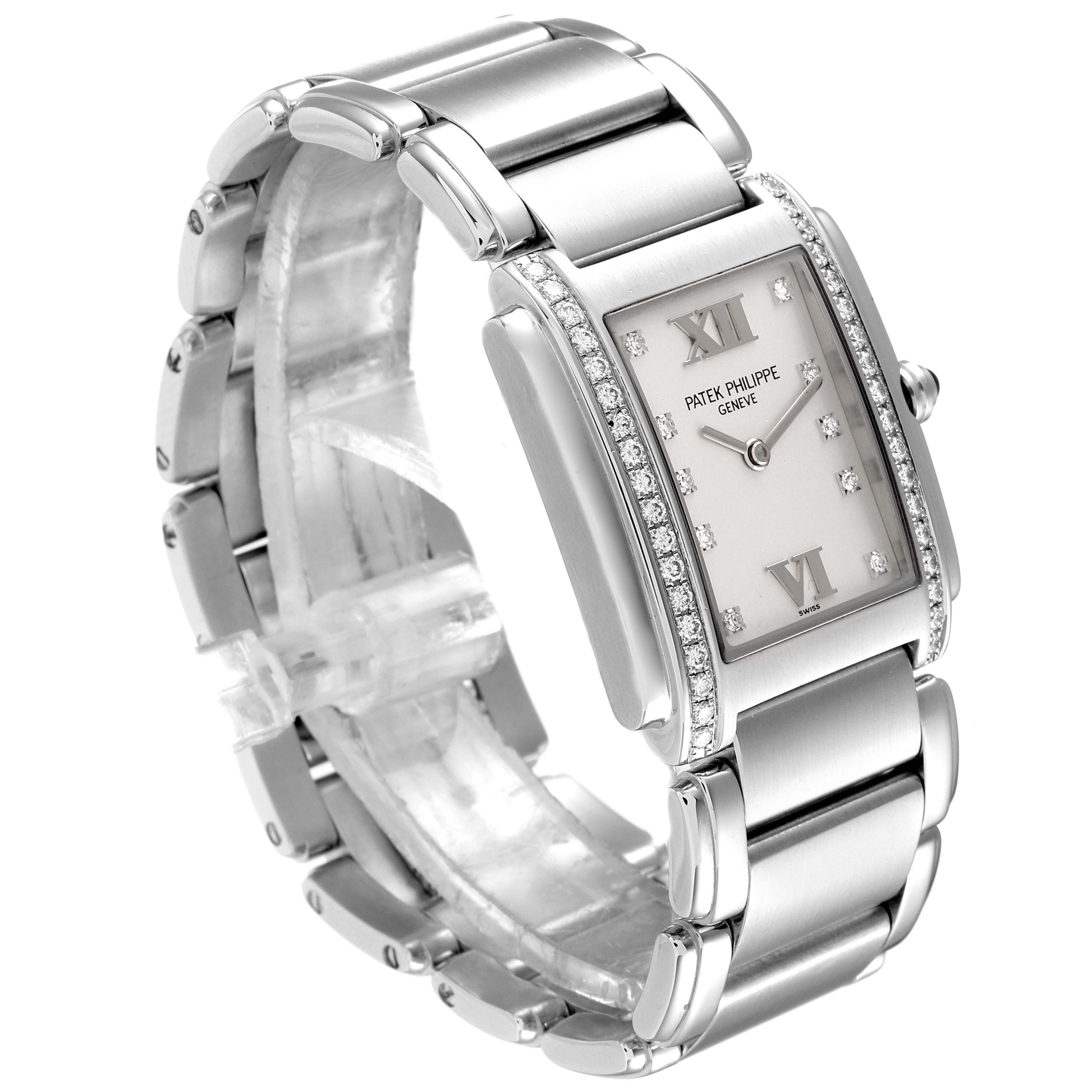 The image shows a side angle of a Patek Philippe Twenty-4 4910/10A-010 Women's Stainless Steel Silver Dial 4910/10A-010 Women's Stainless Steel Silver Dial model, highlighting the face, bezel, and bracelet.