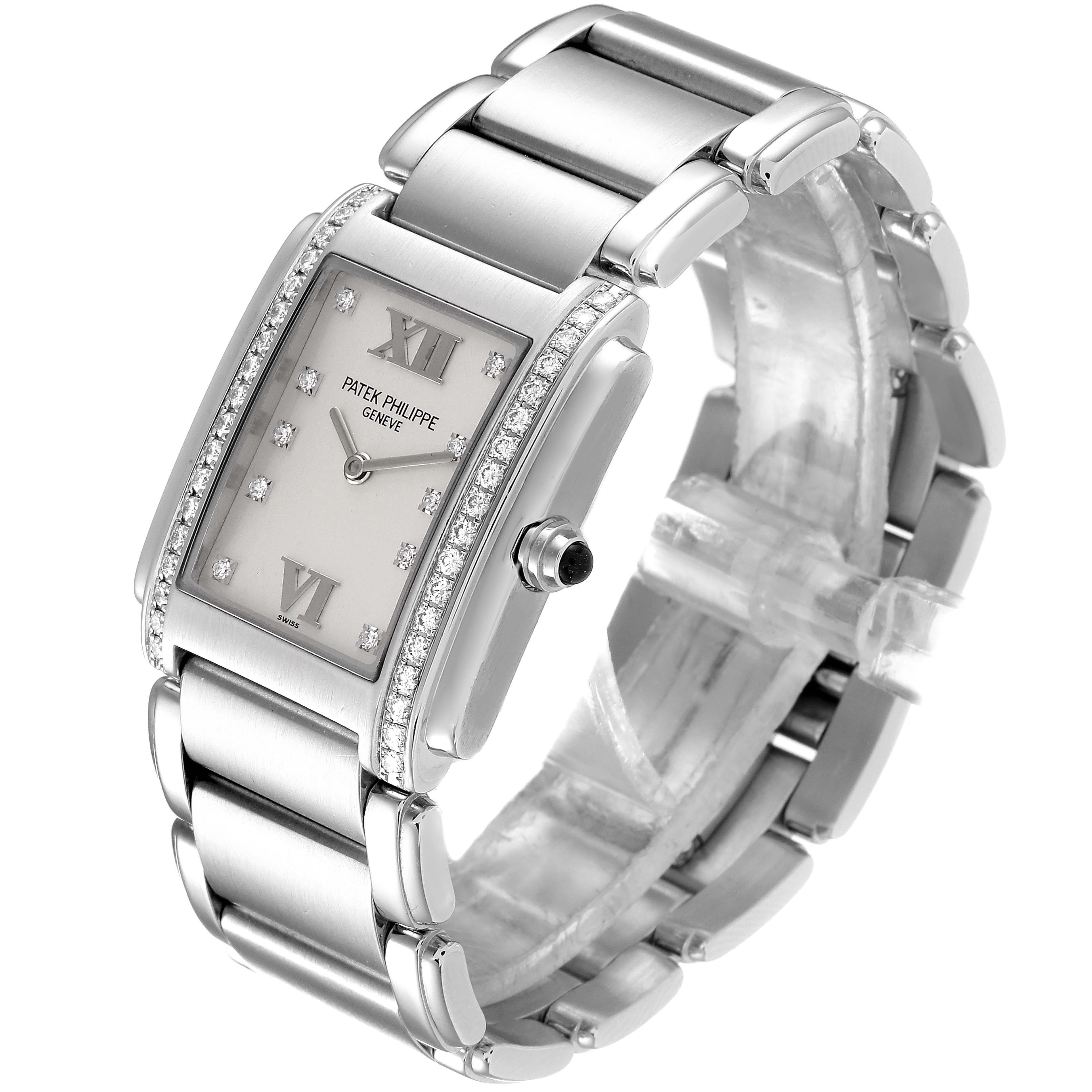 This image shows a side-angle view of a Patek Philippe Twenty-4 4910/10A-010 Women's Stainless Steel Silver Dial 4910/10A-010 Women's Stainless Steel Silver Dial model watch, highlighting the dial, bezel, case, and bracelet.