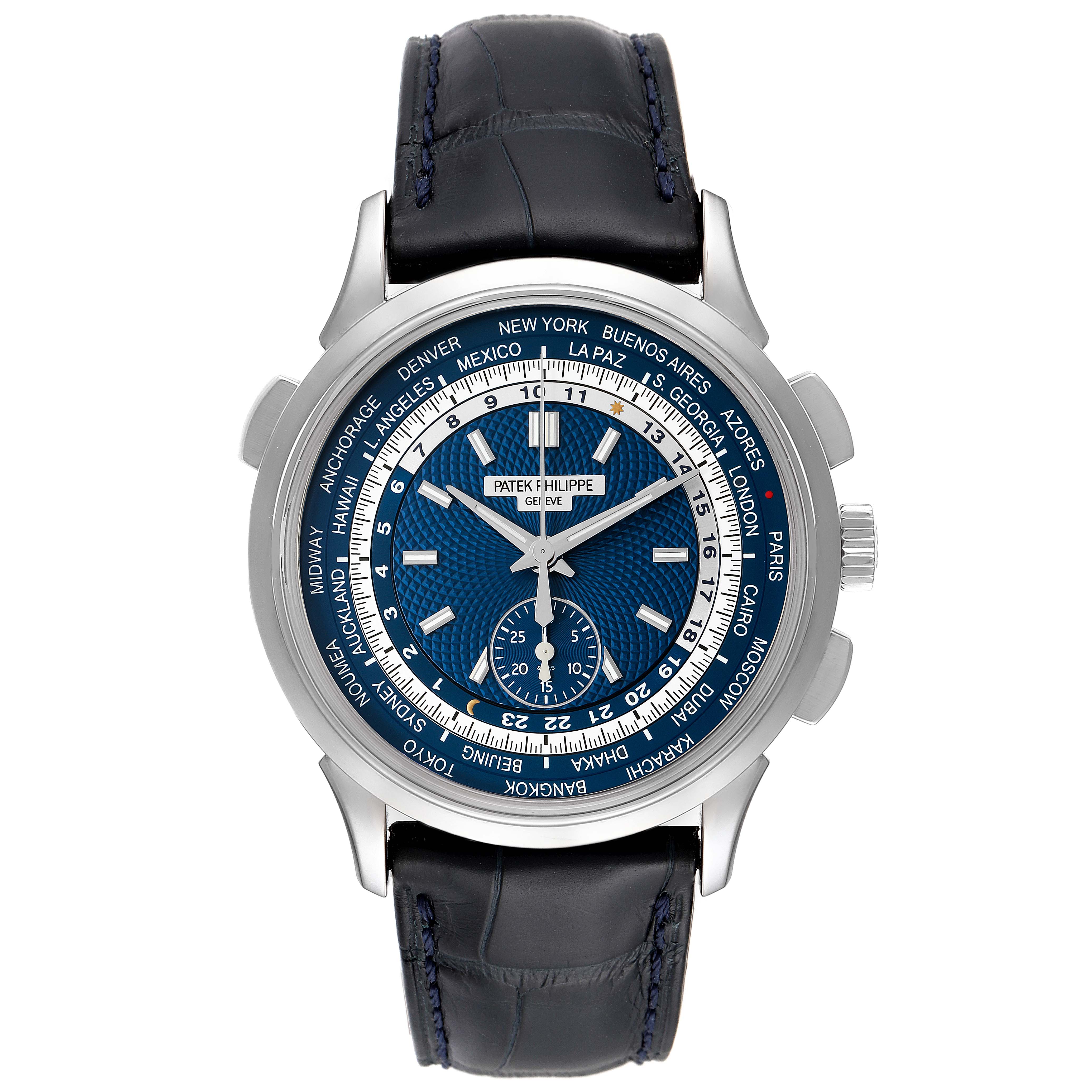 The image shows a front view of a Patek Philippe Complications 5930G-001 Men
s White Gold Blue Dial 5930G-001 Men
s White Gold Blue Dial watch, featuring a blue dial and indicators for different time zones.