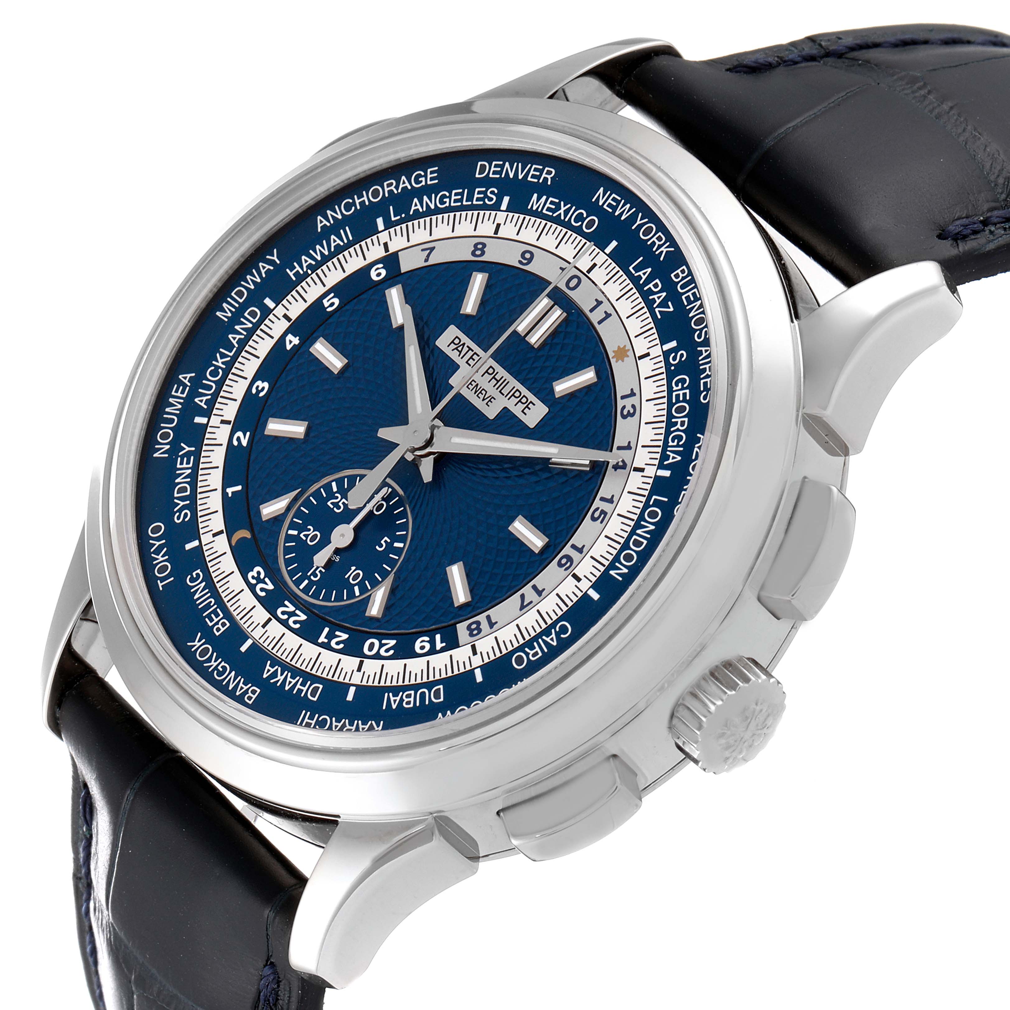 The image shows a Patek Philippe Complications 5930G-001 Men
s White Gold Blue Dial 5930G-001 Men
s White Gold Blue Dial watch at a three-quarter angle, highlighting the face, crown, and pushers.