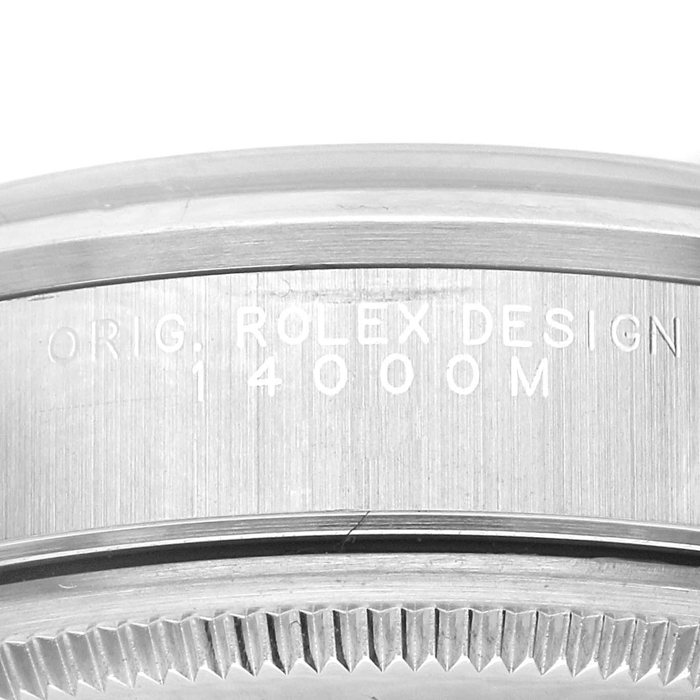 Close-up of the Rolex Air-King 14000M Men's Stainless Steel Black Dial 14000M Men's Stainless Steel Black Dial model showing the engraved text on its metal casing.