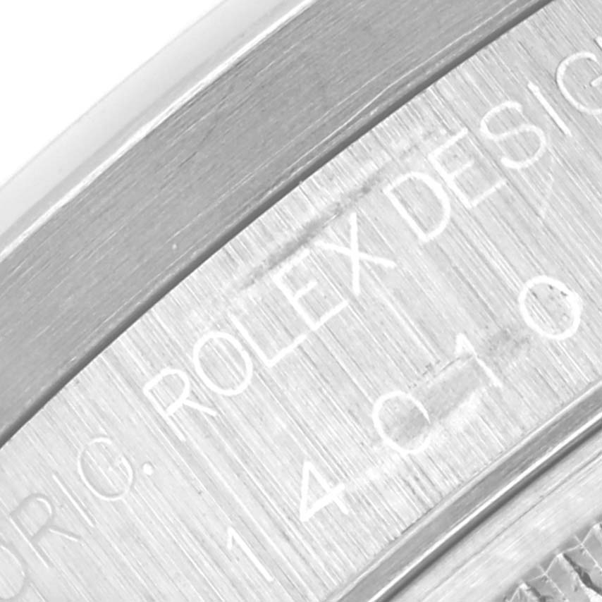 This image shows a close-up of the engraved lettering on the side of the Rolex Air-King 14010 Men's Stainless Steel Black Dial 14010 Men's Stainless Steel Black Dial watch case.