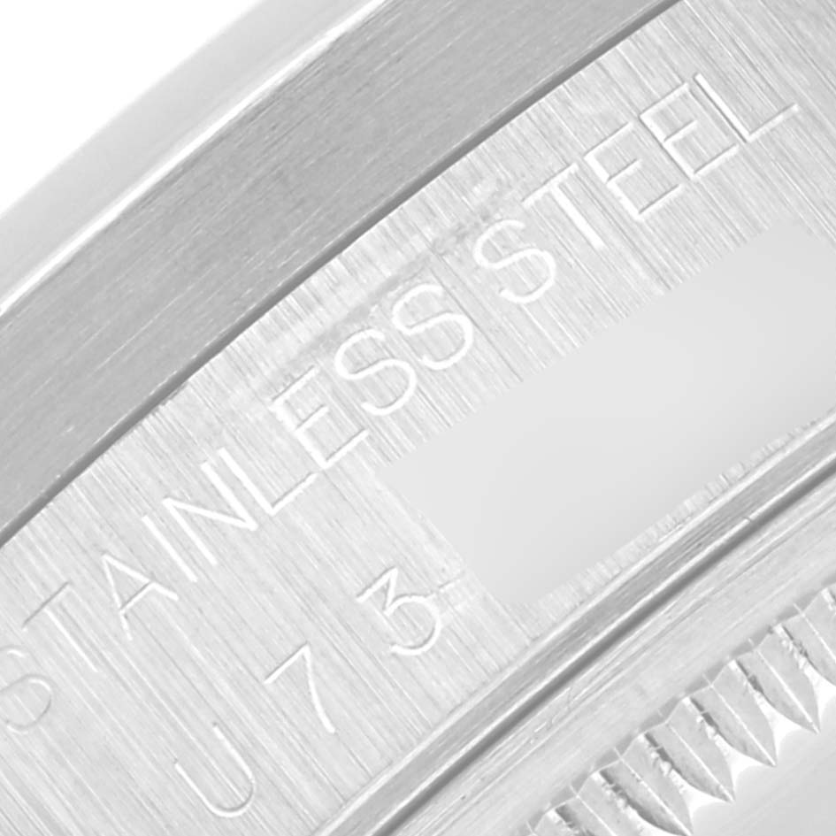 This image shows a close-up of the case back of the Rolex Air-King 14010 Men's Stainless Steel Black Dial 14010 Men's Stainless Steel Black Dial, highlighting the stainless steel engraving.