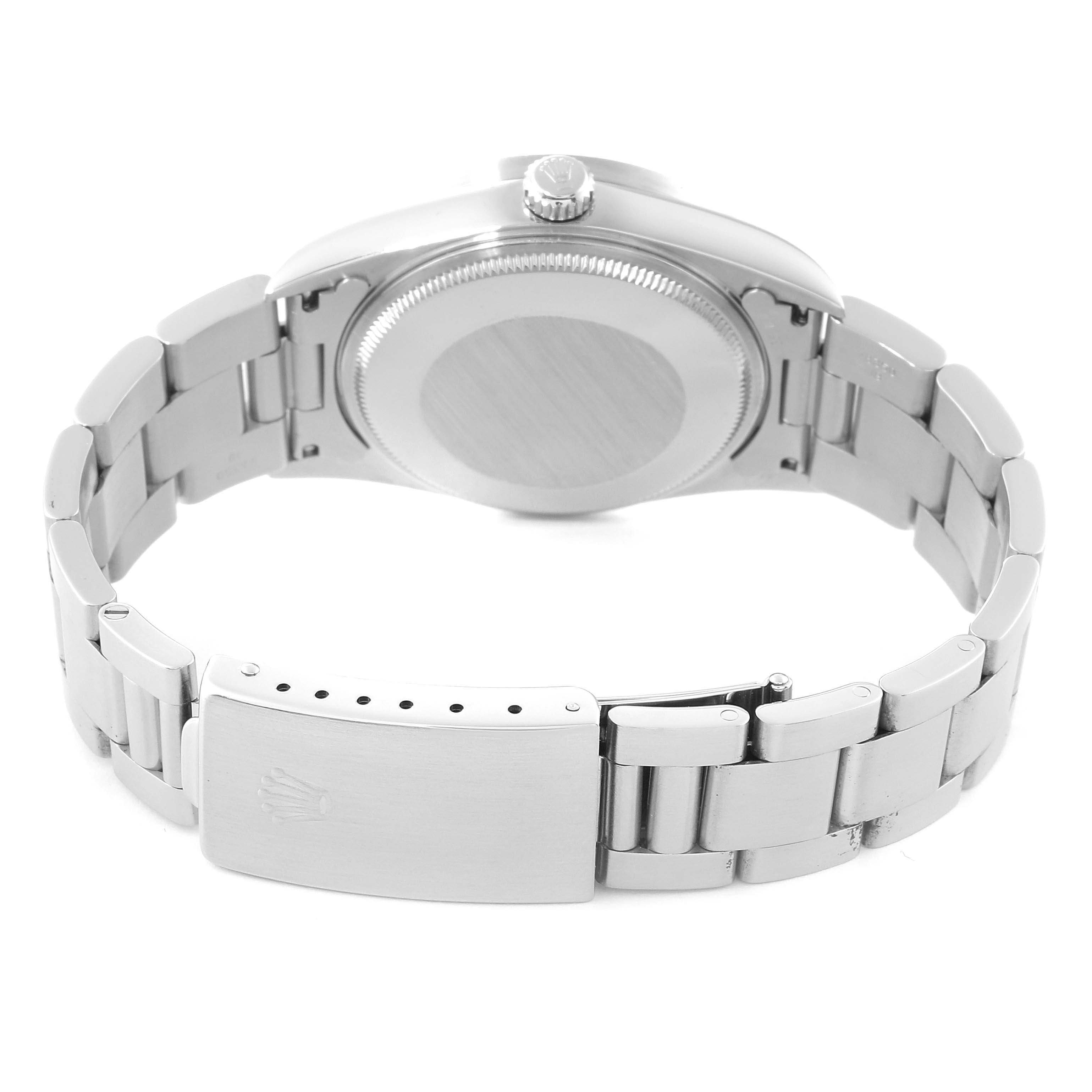 The image shows the back view of a Rolex Air-King 14010 Men's Stainless Steel Black Dial 14010 Men's Stainless Steel Black Dial watch, focusing on the watch case, crown, and bracelet with a clasp.