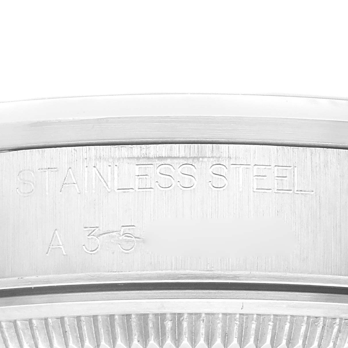 This image shows a close-up of the case back and engraving on a Rolex Date 15200 Men
s Stainless Steel Silver Dial 15200 Men
s Stainless Steel Silver Dial model watch.