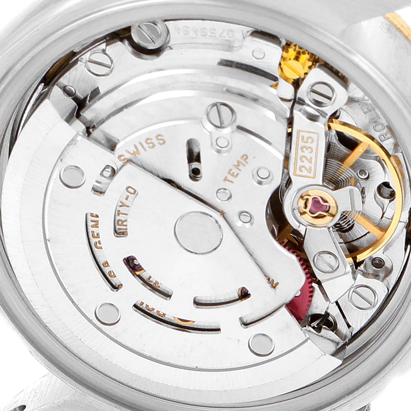 This image shows a close-up of the movement mechanism inside a Rolex Datejust 79173 Women's Steel and Gold (two tone) White Dial 79173 Women's Steel and Gold (two tone) White Dial watch.