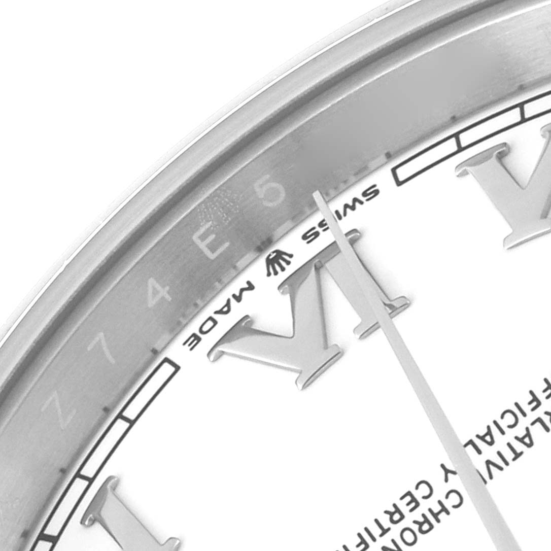 The image shows a close-up of the dial and part of the bezel of a Rolex Datejust 41 126300 Men's Stainless Steel White Dial 126300 Men's Stainless Steel White Dial, featuring Roman numerals and the brand's logo.
