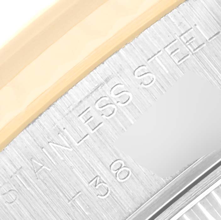 The image shows a close-up of the case side and bezel of a Rolex Datejust 69173 Women's Steel and Gold (two tone) Champagne Dial 69173 Women's Steel and Gold (two tone) Champagne Dial watch, highlighting the brushed stainless steel and gold accents.