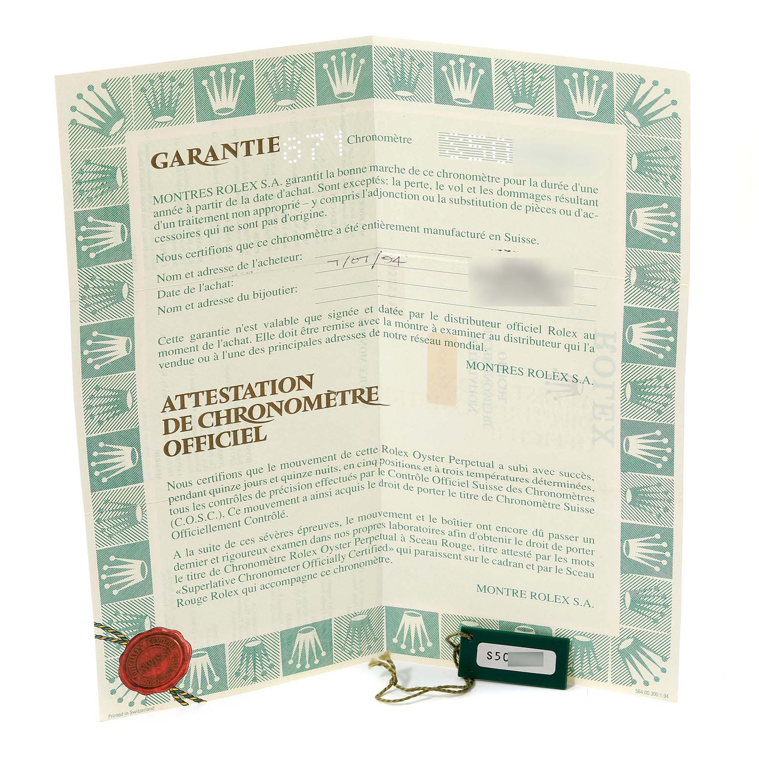 This image shows the warranty card and chronometer certificate for a Rolex Datejust 69173 Women's Steel and Gold (two tone) Champagne Dial 69173 Women's Steel and Gold (two tone) Champagne Dial watch.