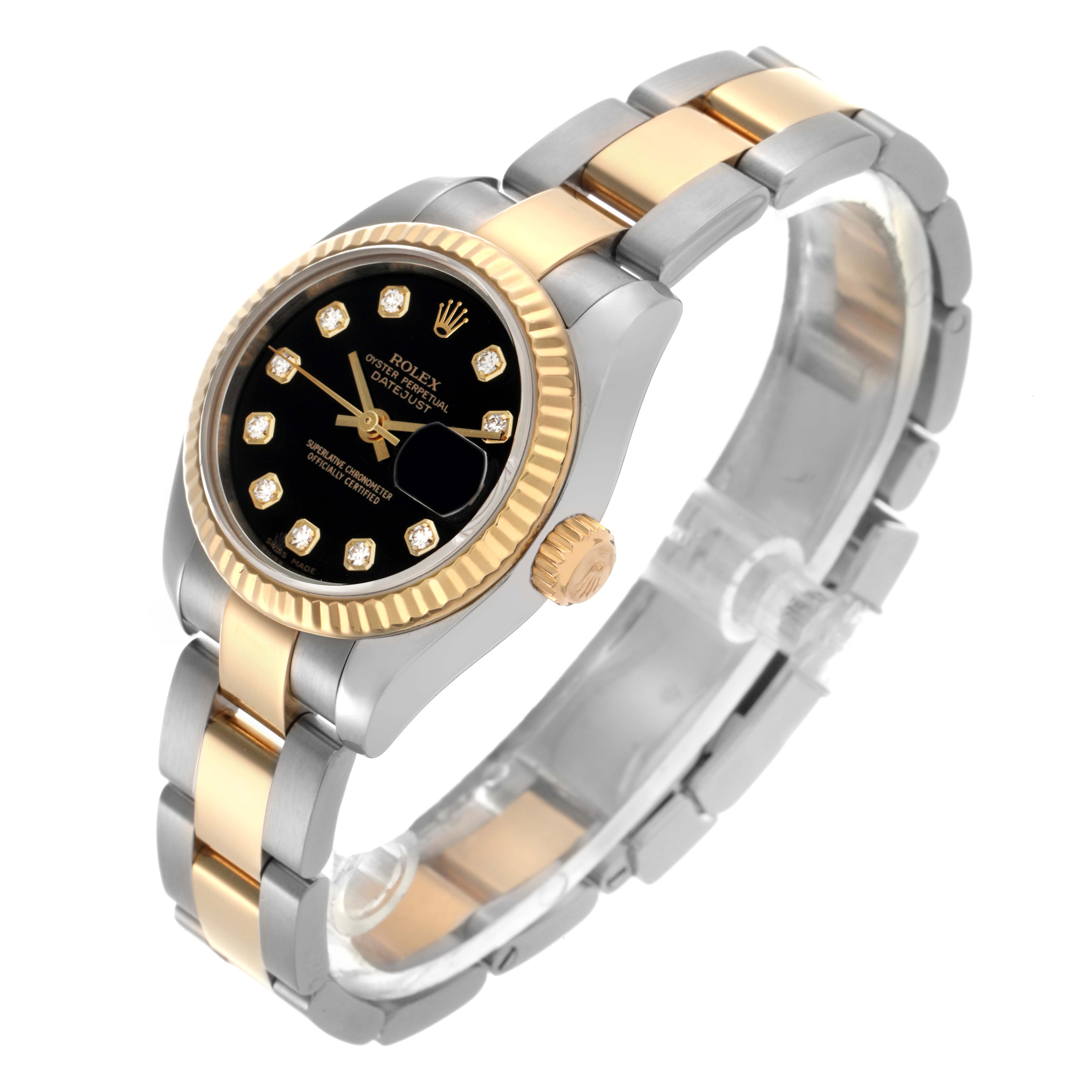 The Rolex Datejust 179173 Women
s Steel and Gold (two tone) Black Dial 179173 Women
s Steel and Gold (two tone) Black Dial watch is shown from a three-quarter angle, highlighting the bezel, bracelet, crown, and black diamond-accented dial.