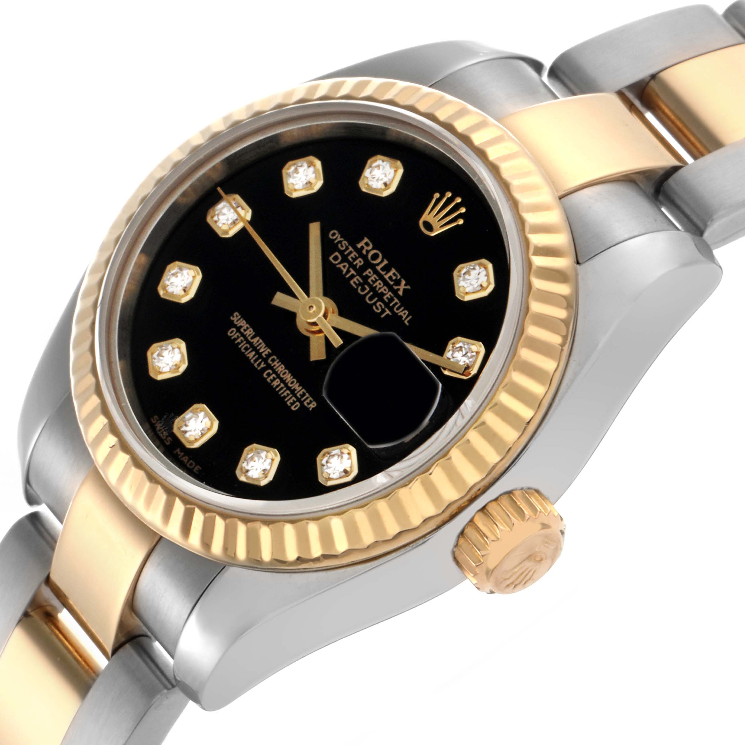 The image shows a Rolex Datejust 179173 Women
s Steel and Gold (two tone) Black Dial 179173 Women
s Steel and Gold (two tone) Black Dial watch from an angled top view, highlighting the bezel, dial, and part of the bracelet.