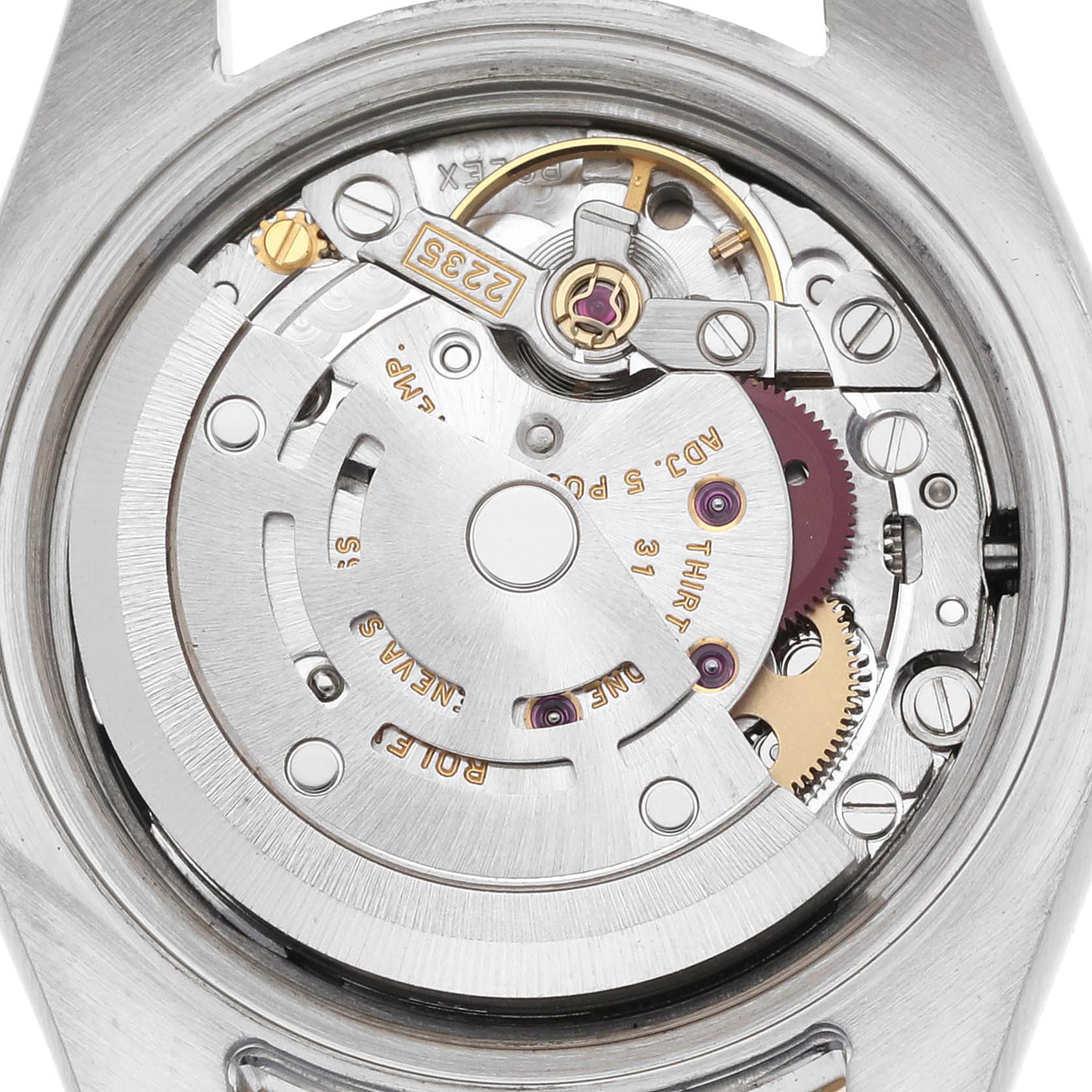 The image shows the movement of a Rolex Datejust 179173 Women
s Steel and Gold (two tone) Black Dial 179173 Women
s Steel and Gold (two tone) Black Dial watch from a top-down angle, highlighting its intricate mechanical components.