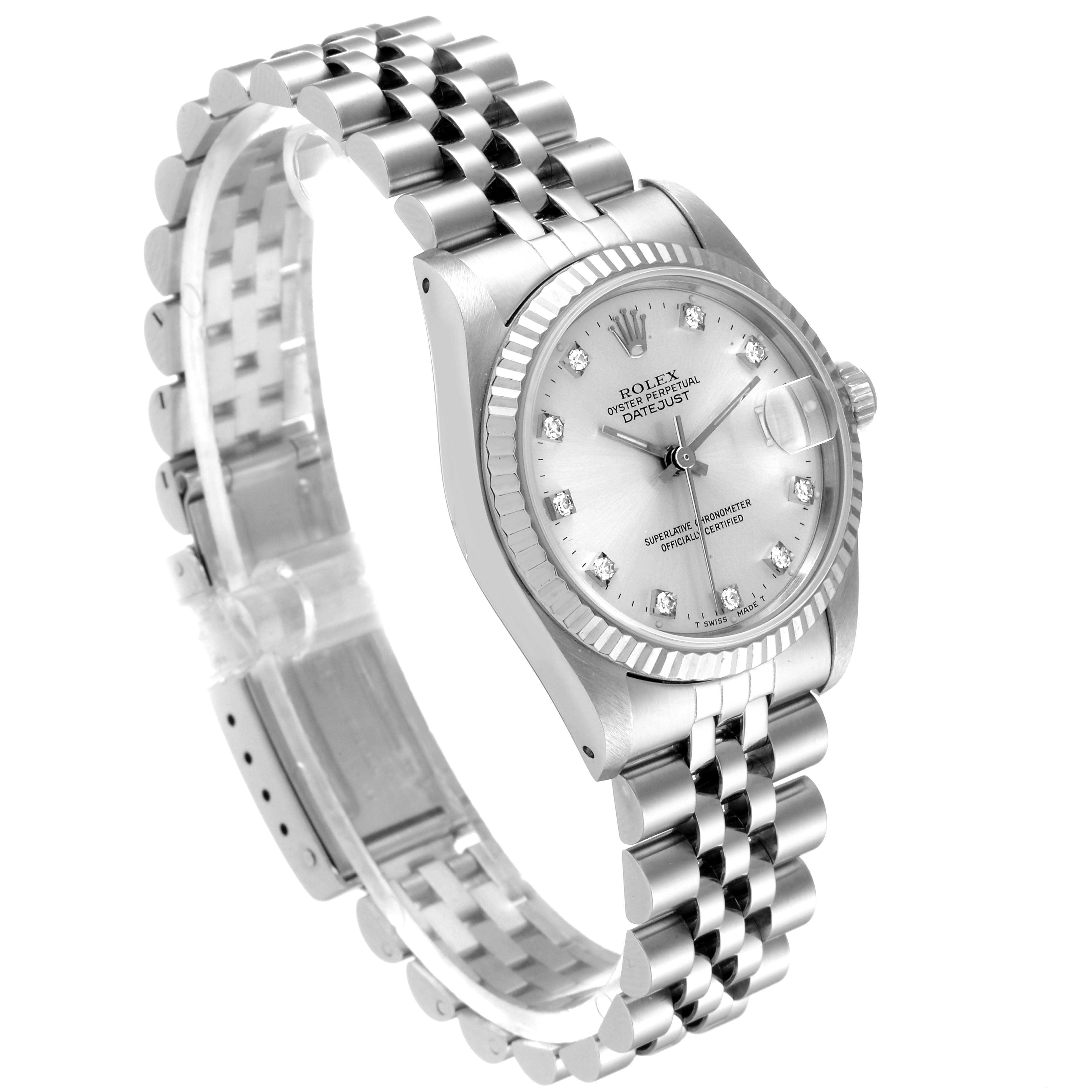 The image shows a side view angle of a Rolex Mid-Size 68274 Women
s Stainless Steel Silver Dial 68274 Women
s Stainless Steel Silver Dial Datejust watch, highlighting the dial, fluted bezel, and Jubilee bracelet.