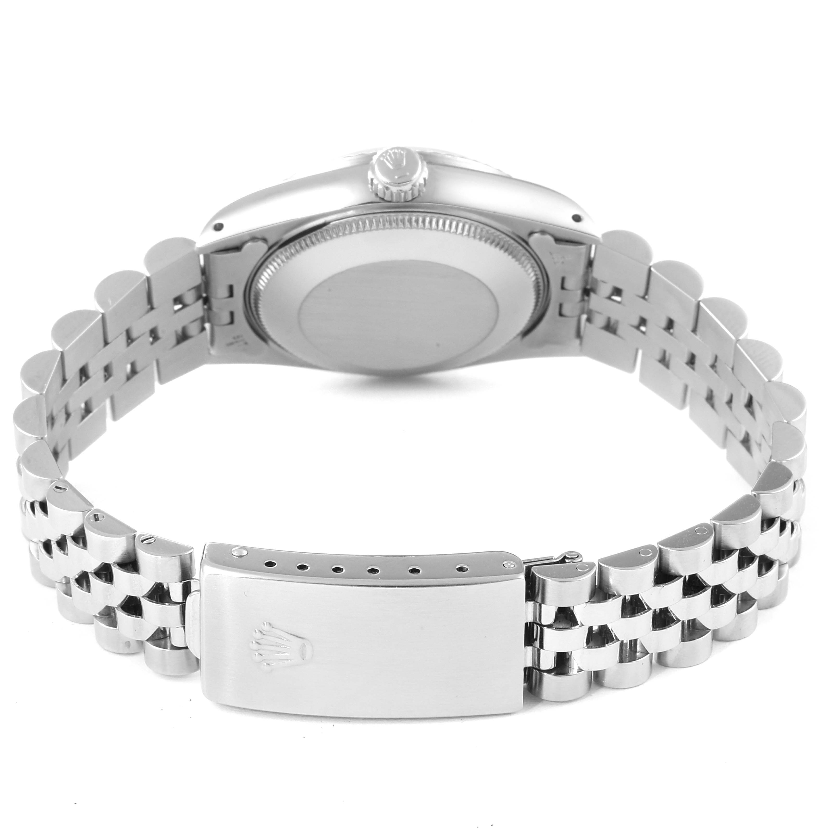 The image shows the back of a Mid-Size Rolex watch, including the case back, crown, and clasp with the Rolex logo.