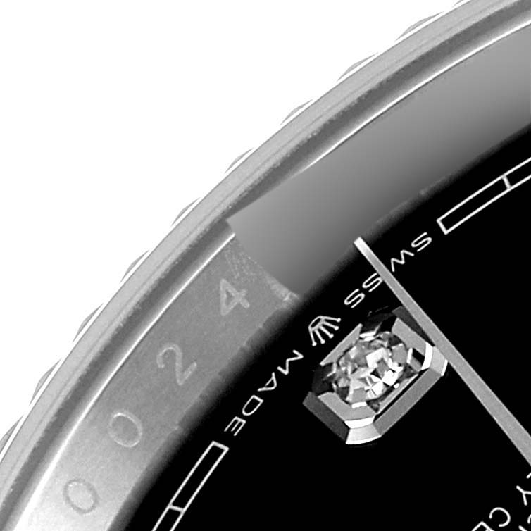 This image shows a close-up angle of a diamond marker and part of the bezel on a Rolex Datejust 126234 Men's Stainless Steel Black Dial 126234 Men's Stainless Steel Black Dial watch.