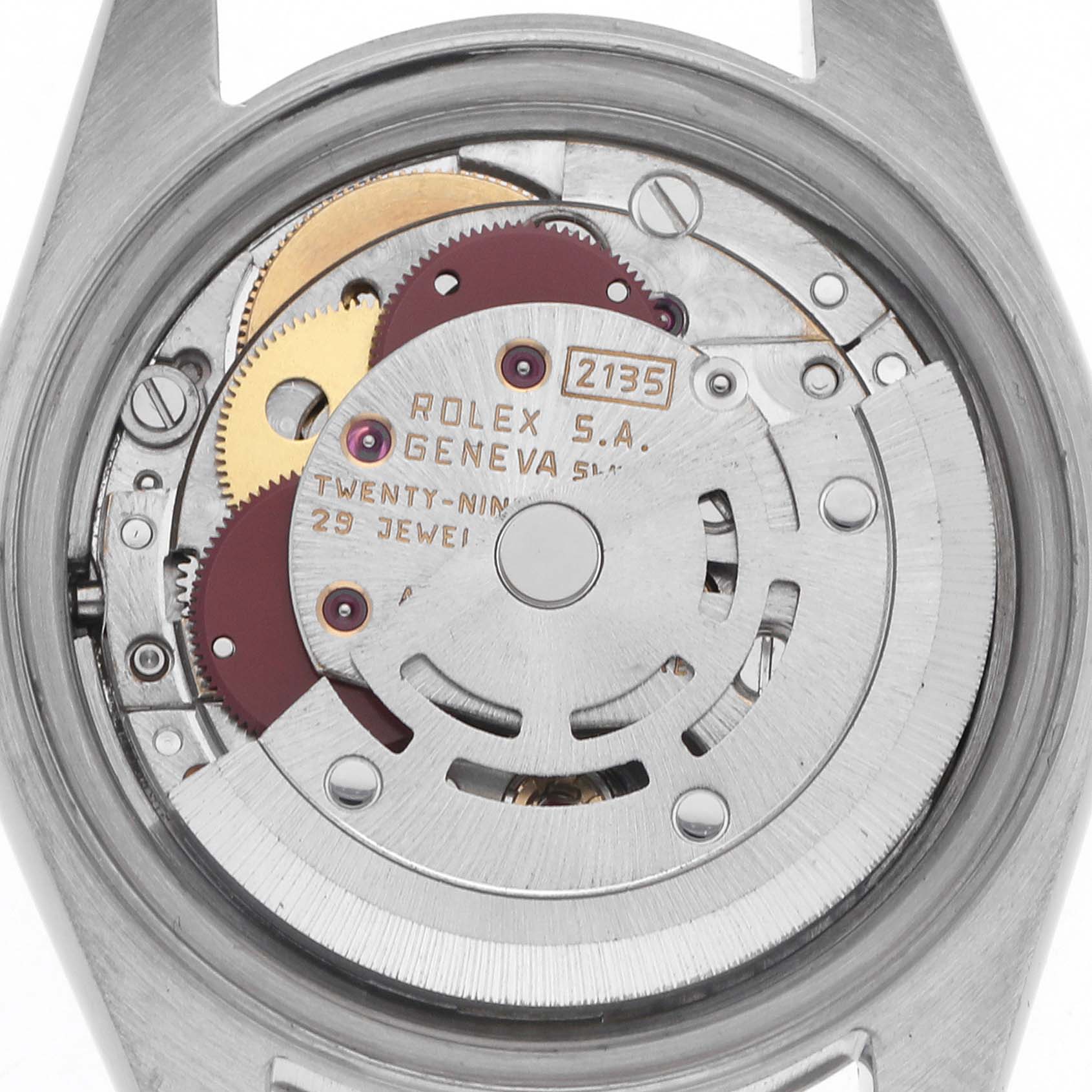 The image shows the exposed movement mechanism of a Rolex Datejust 69174 Women
s Stainless Steel Silver Dial 69174 Women
s Stainless Steel Silver Dial watch viewed from the back.