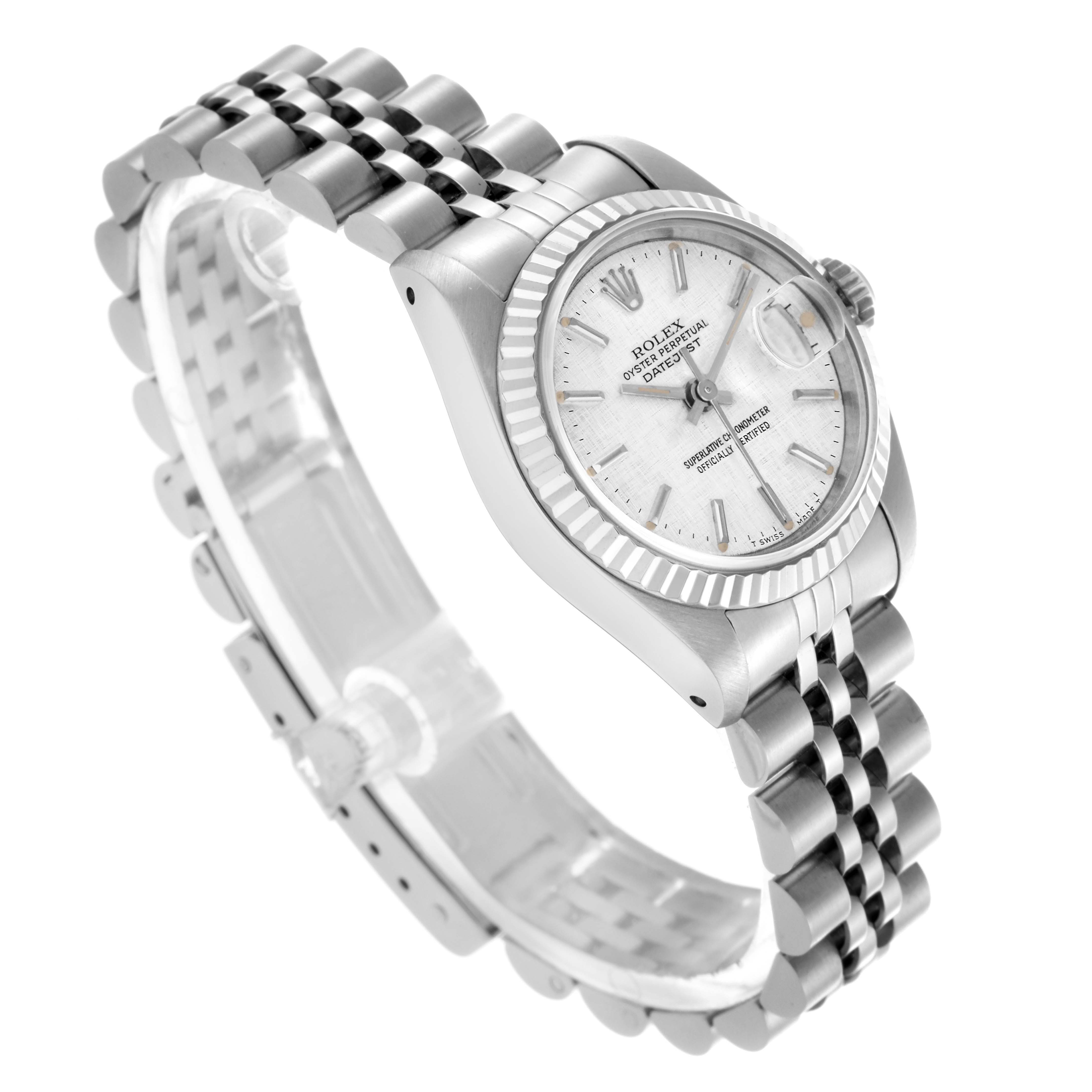 The Rolex Datejust 69174 Women
s Stainless Steel Silver Dial 69174 Women
s Stainless Steel Silver Dial watch is shown from an angled view, highlighting the dial, fluted bezel, and jubilee bracelet.