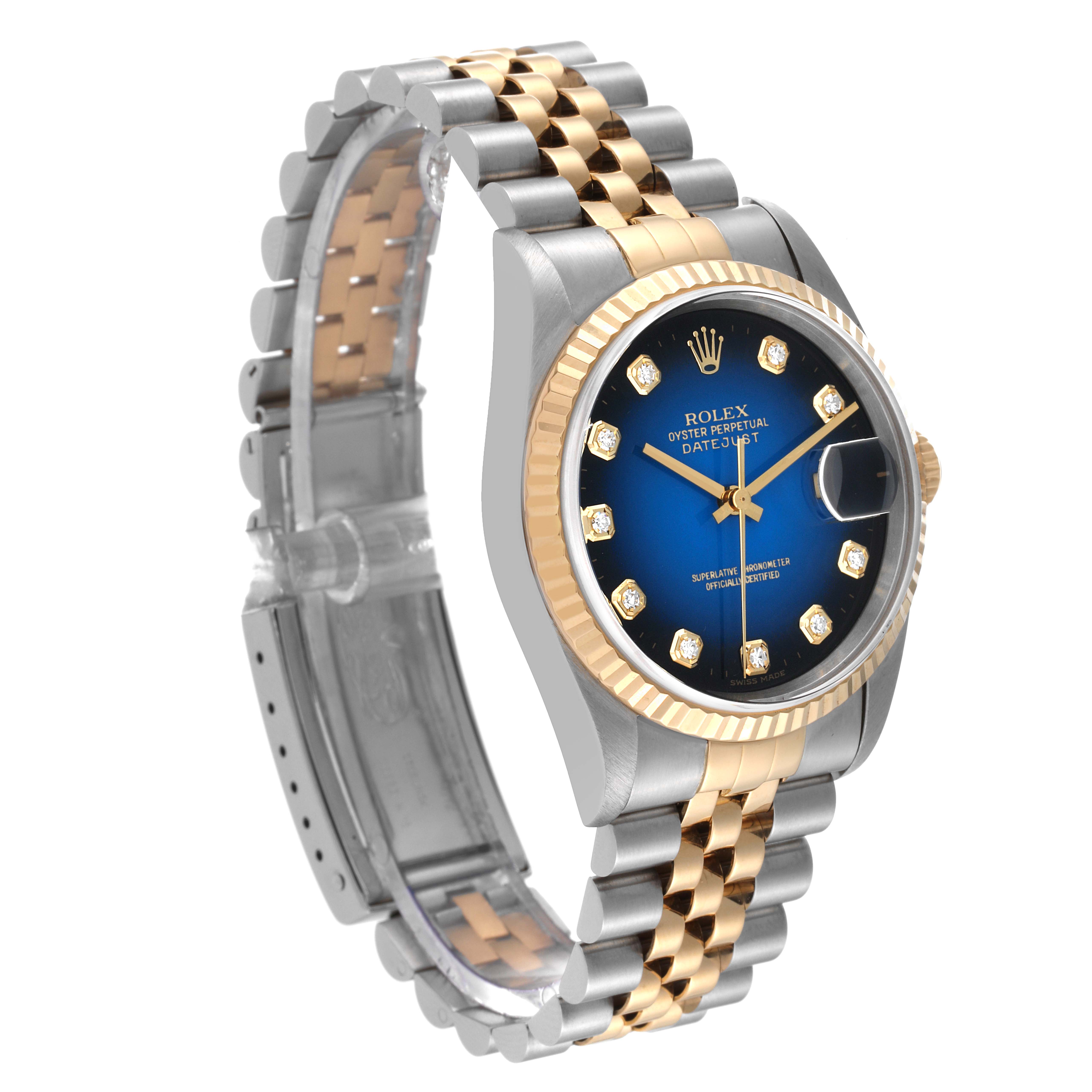 The Rolex Datejust 16233 Men's Steel and Gold (two tone) Blue Dial 16233 Men's Steel and Gold (two tone) Blue Dial watch is shown at an angled view displaying its face, bezel, and bracelet.
