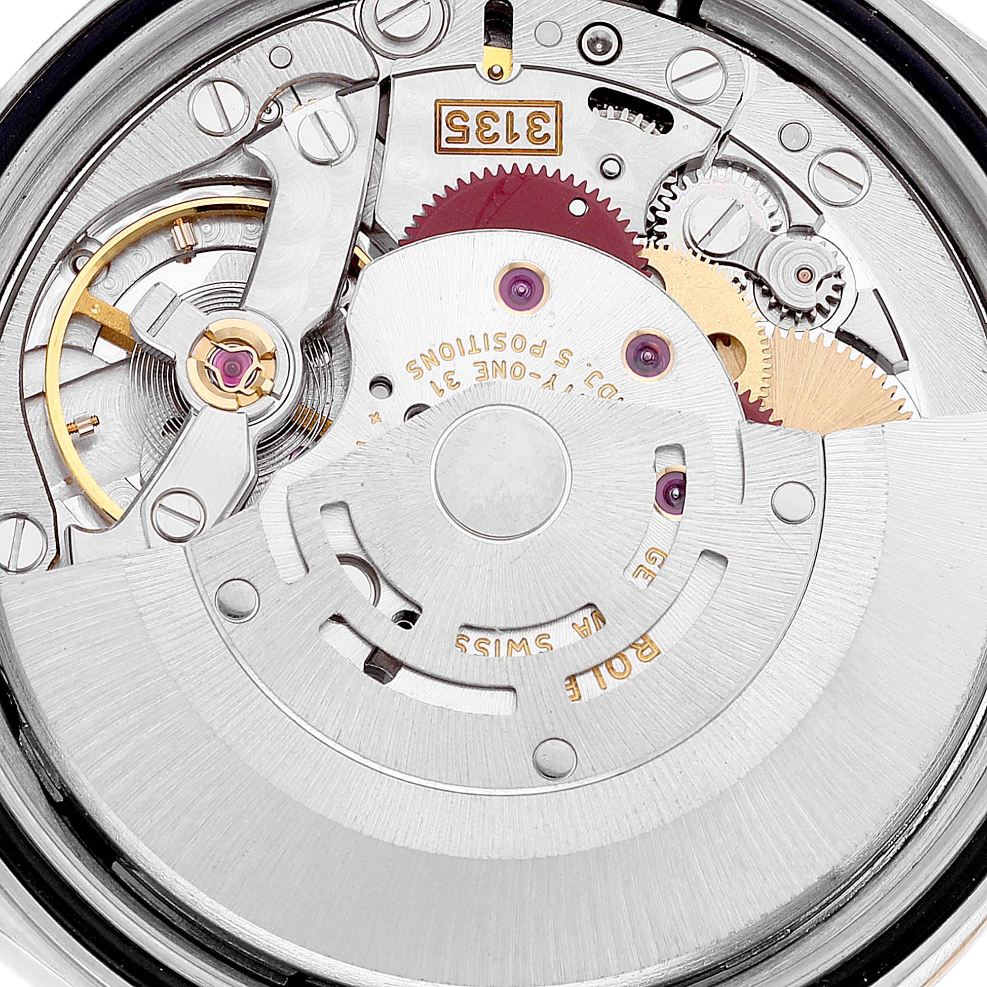 This image shows the inner mechanical components of a Rolex Datejust 16233 Men's Steel and Gold (two tone) Blue Dial 16233 Men's Steel and Gold (two tone) Blue Dial watch, focusing on its movement.