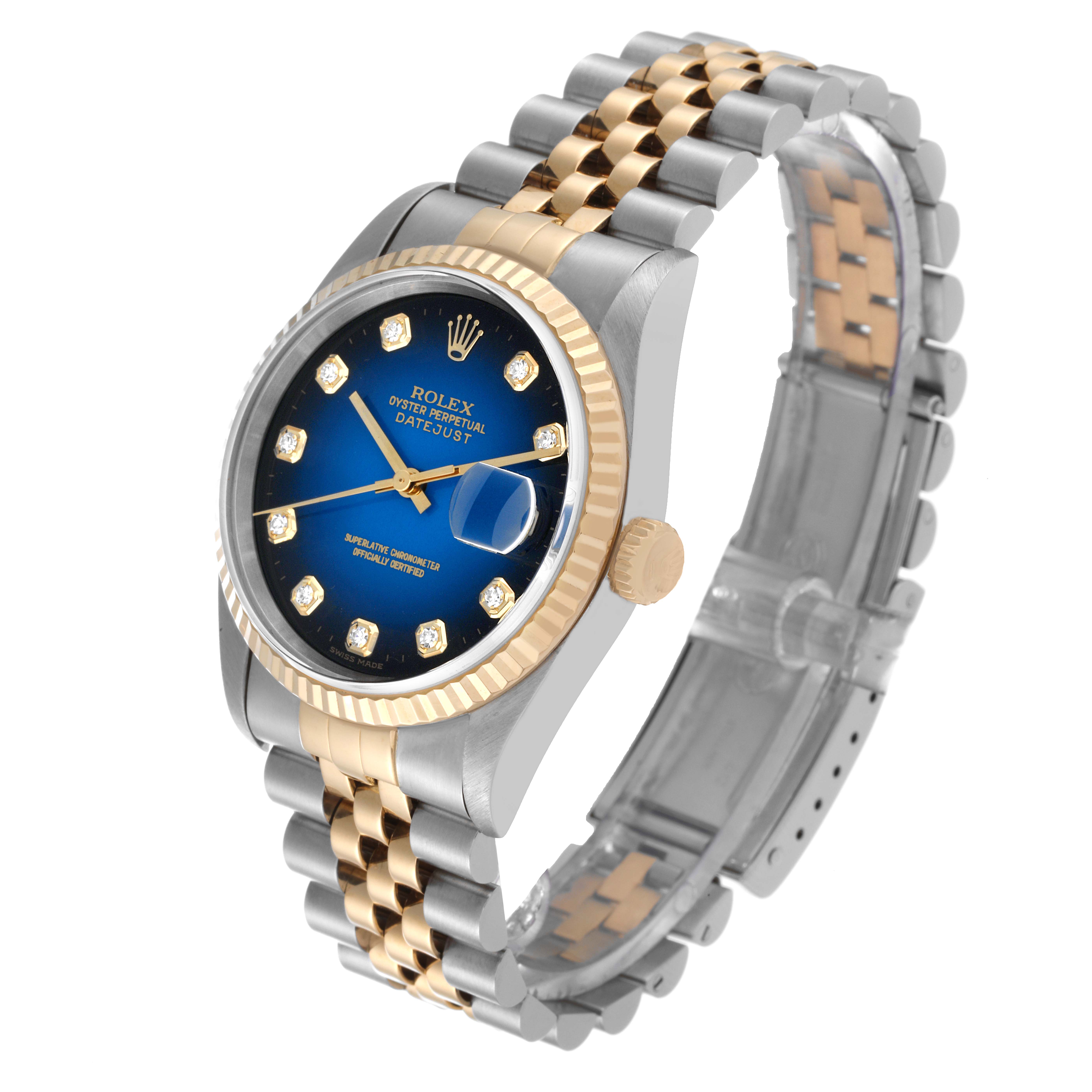 The image shows a Rolex Datejust 16233 Men's Steel and Gold (two tone) Blue Dial 16233 Men's Steel and Gold (two tone) Blue Dial watch at a three-quarter angle highlighting its blue dial, gold fluted bezel, and two-tone bracelet.