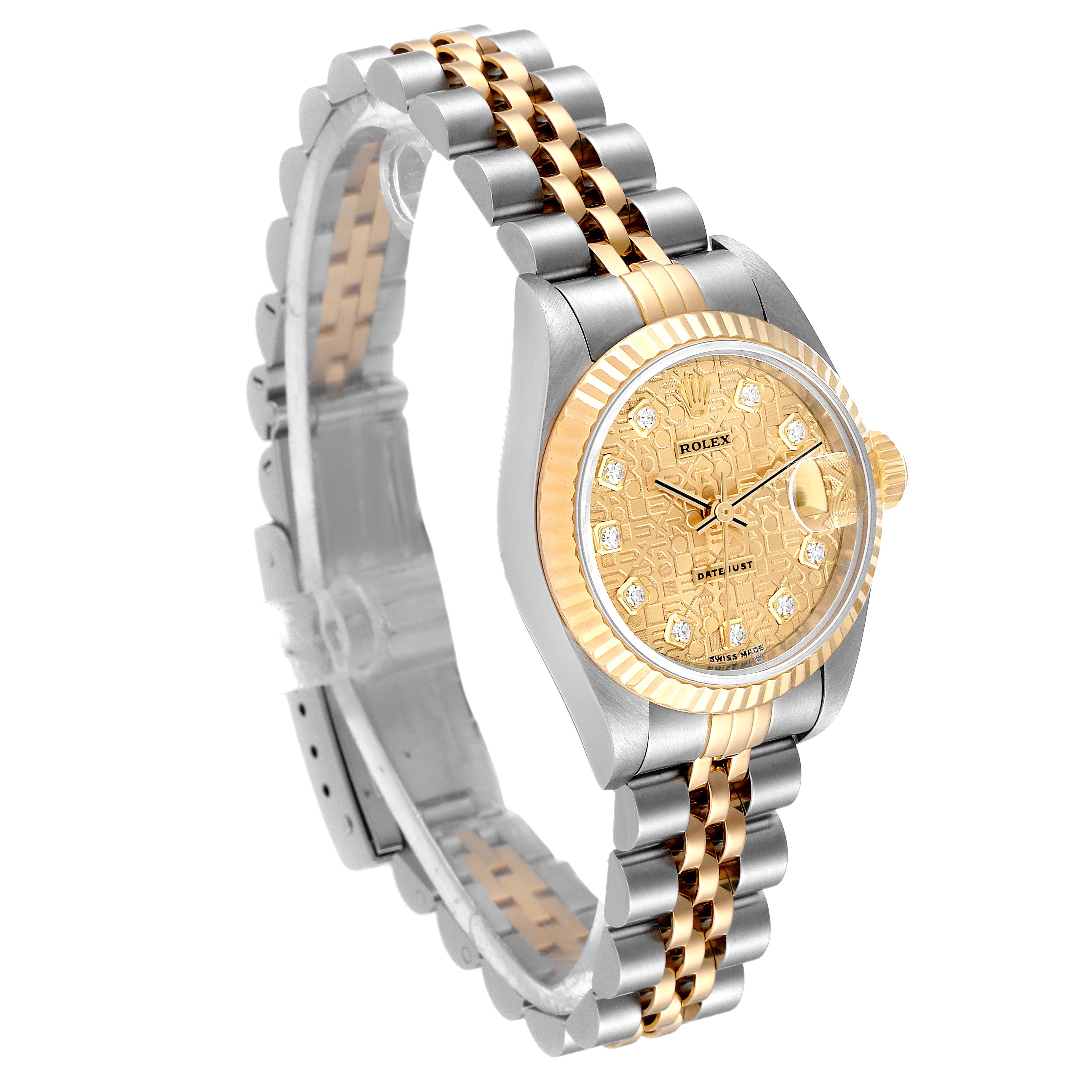 The Rolex Datejust 79173 Women
s Steel and Gold (two tone) Champagne Dial 79173 Women
s Steel and Gold (two tone) Champagne Dial watch is shown at a slight angle, highlighting the dual-tone bracelet, fluted bezel, and detailed dial.