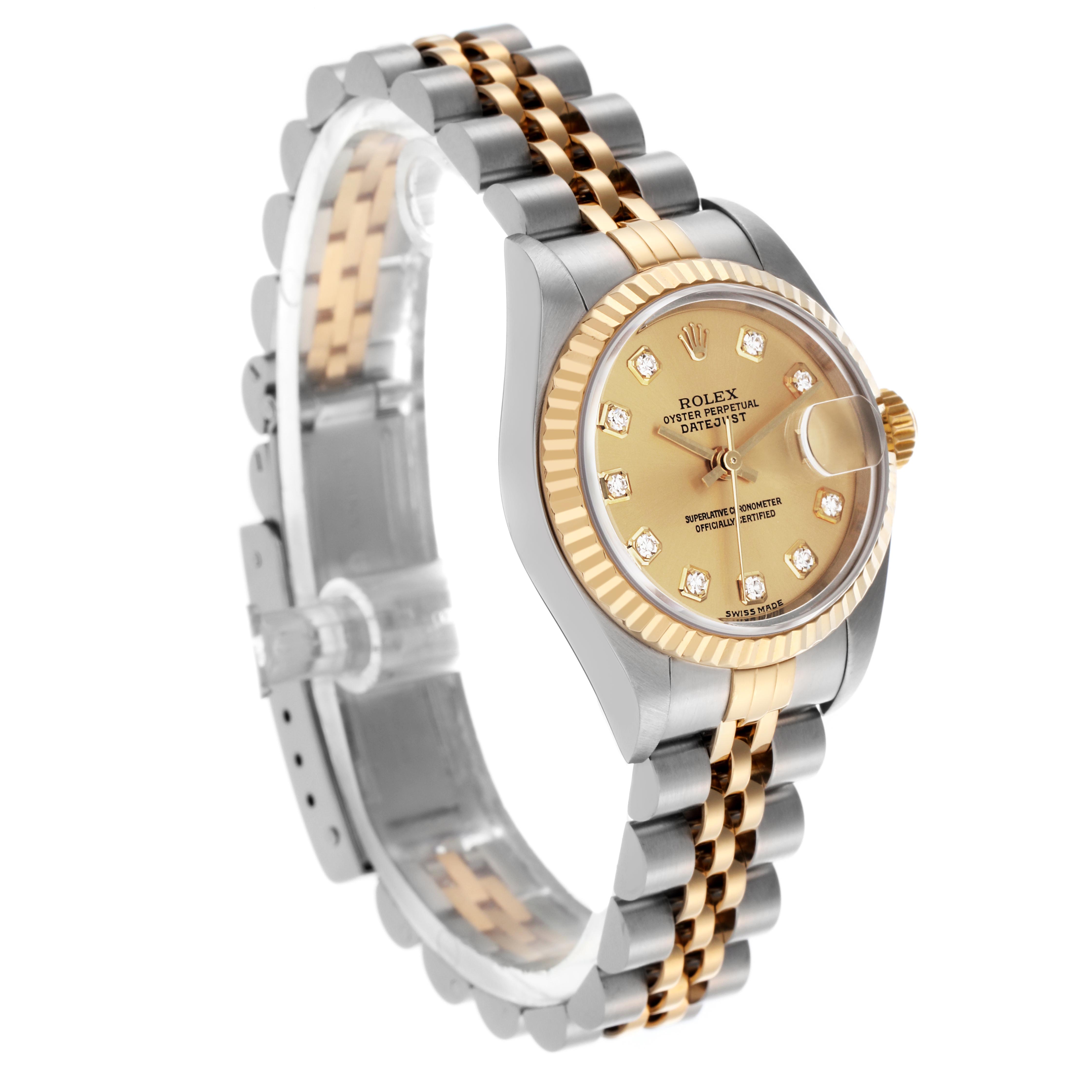 The Rolex Datejust 79173 Women
s Steel and Gold (two tone) Champagne Dial 79173 Women
s Steel and Gold (two tone) Champagne Dial watch is shown at a slight angle highlighting the face, bezel, and two-tone bracelet.