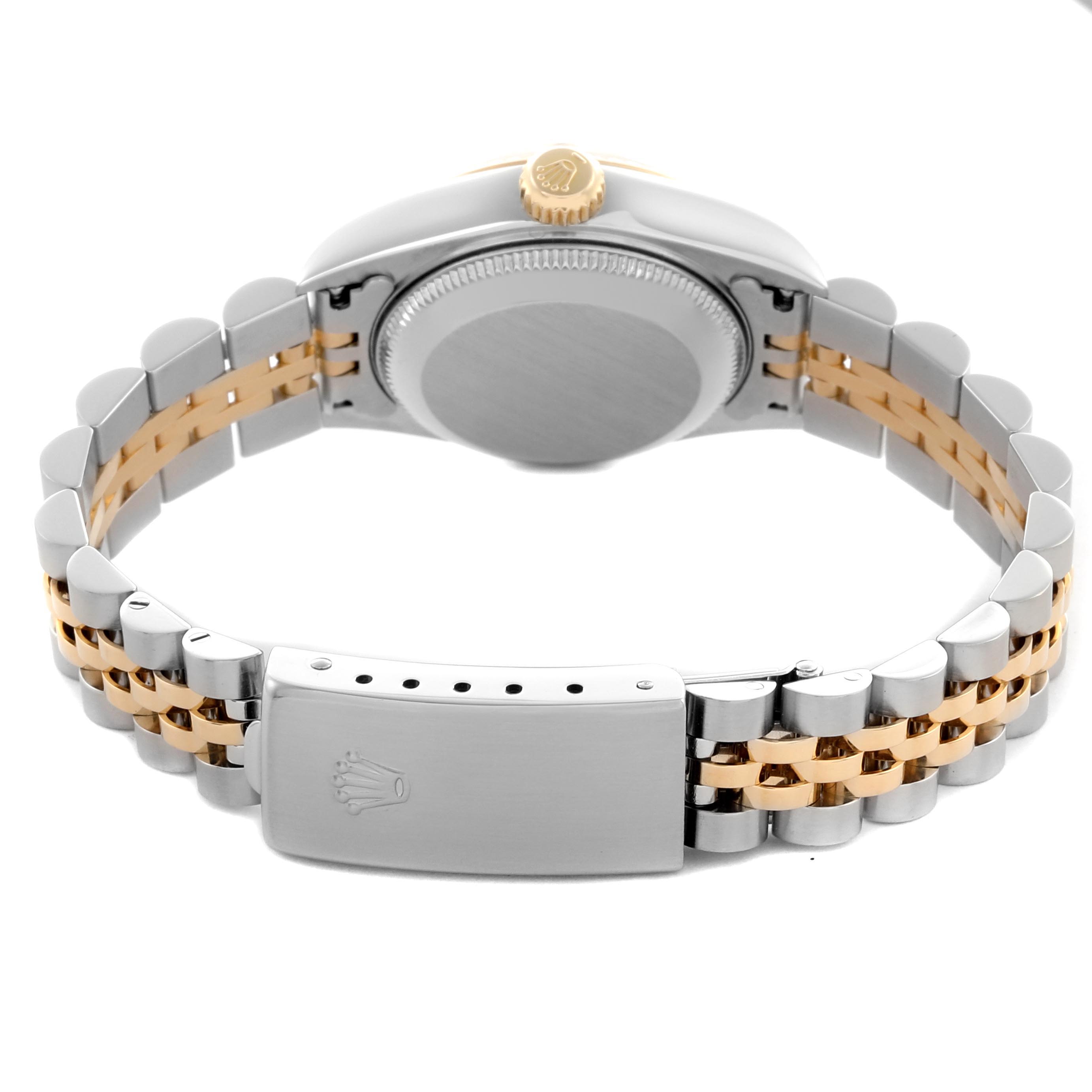 The image shows the backside of a Rolex Datejust 79173 Women
s Steel and Gold (two tone) Champagne Dial 79173 Women
s Steel and Gold (two tone) Champagne Dial with a two-tone jubilee bracelet and clasp.