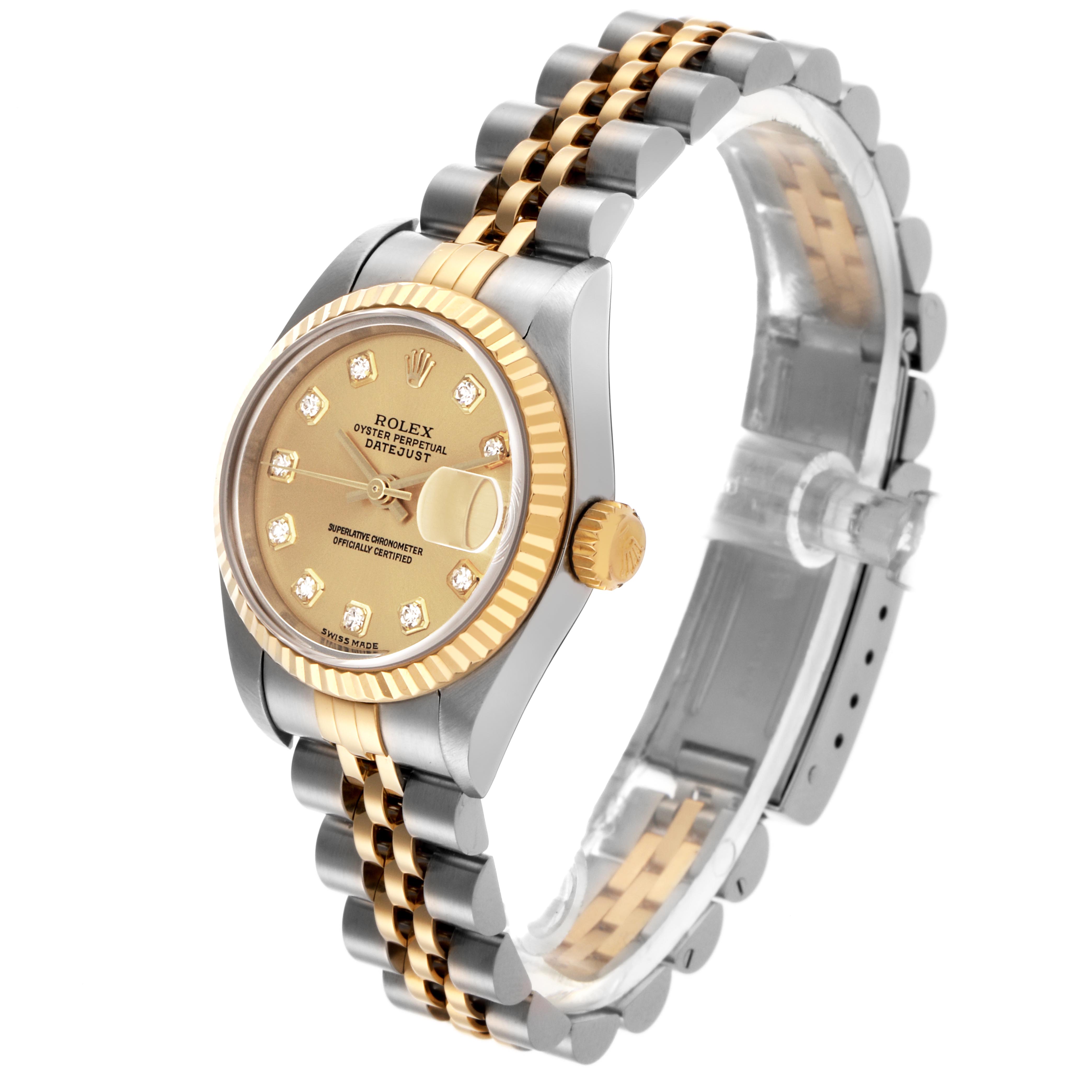 The Rolex Datejust 79173 Women
s Steel and Gold (two tone) Champagne Dial 79173 Women
s Steel and Gold (two tone) Champagne Dial watch is shown at a slight angle, highlighting the face, bezel, crown, and Jubilee bracelet.