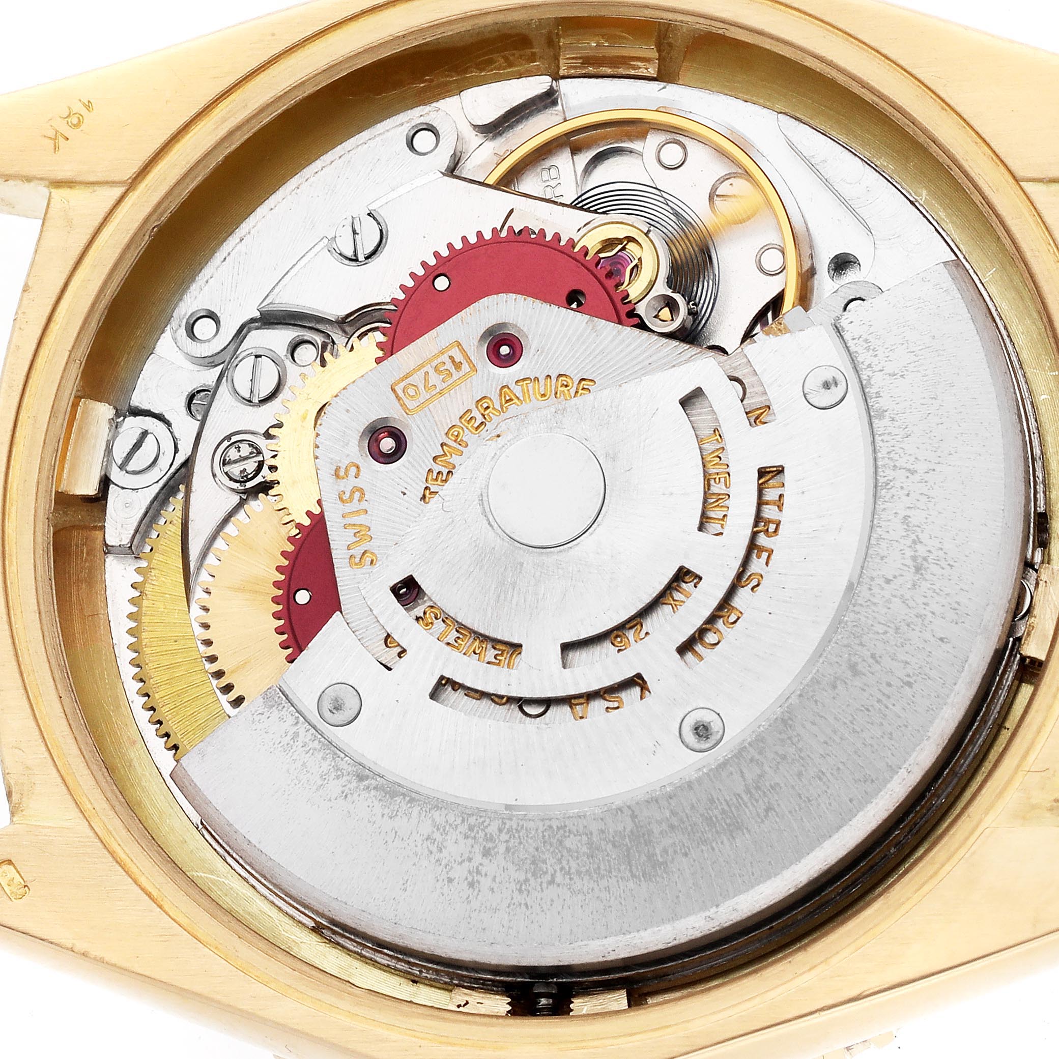 The image shows the movement of the Rolex Turn-o-Graph 1625 Men
s Yellow Gold Champagne Dial 1625 Men
s Yellow Gold Champagne Dial, viewed from the back with visible gears and components.