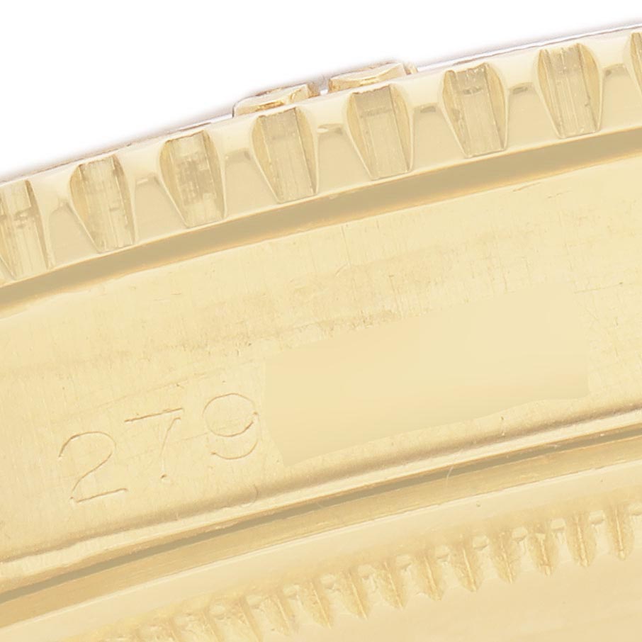 The image shows a close-up of the gold bezel and side case detail of a Rolex Turn-o-Graph 1625 Men
s Yellow Gold Champagne Dial 1625 Men
s Yellow Gold Champagne Dial watch.